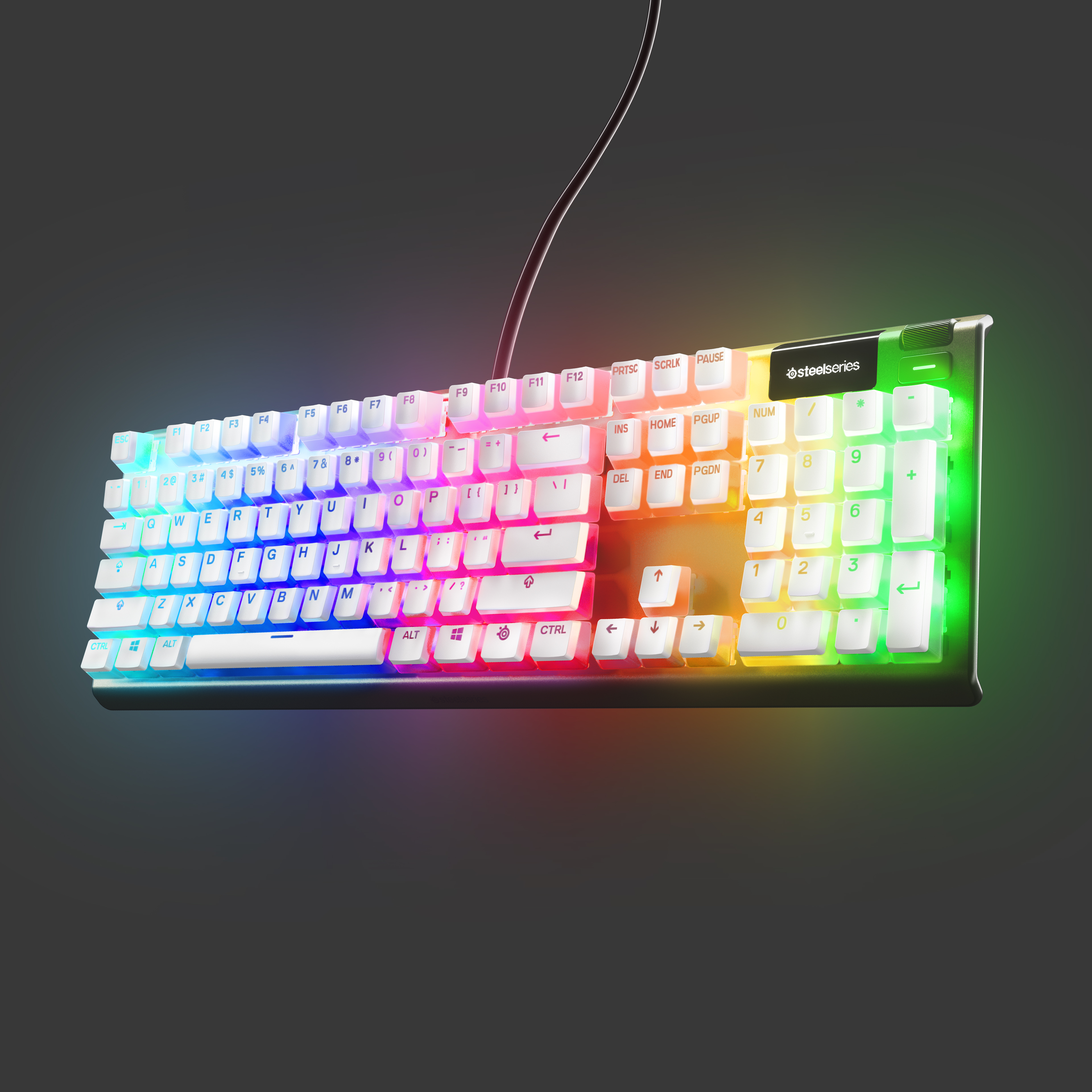 Beyaz tuşlu ve siyah çerçeveli RGB arkadan aydınlatmalı klavye. Gri arka plan.
