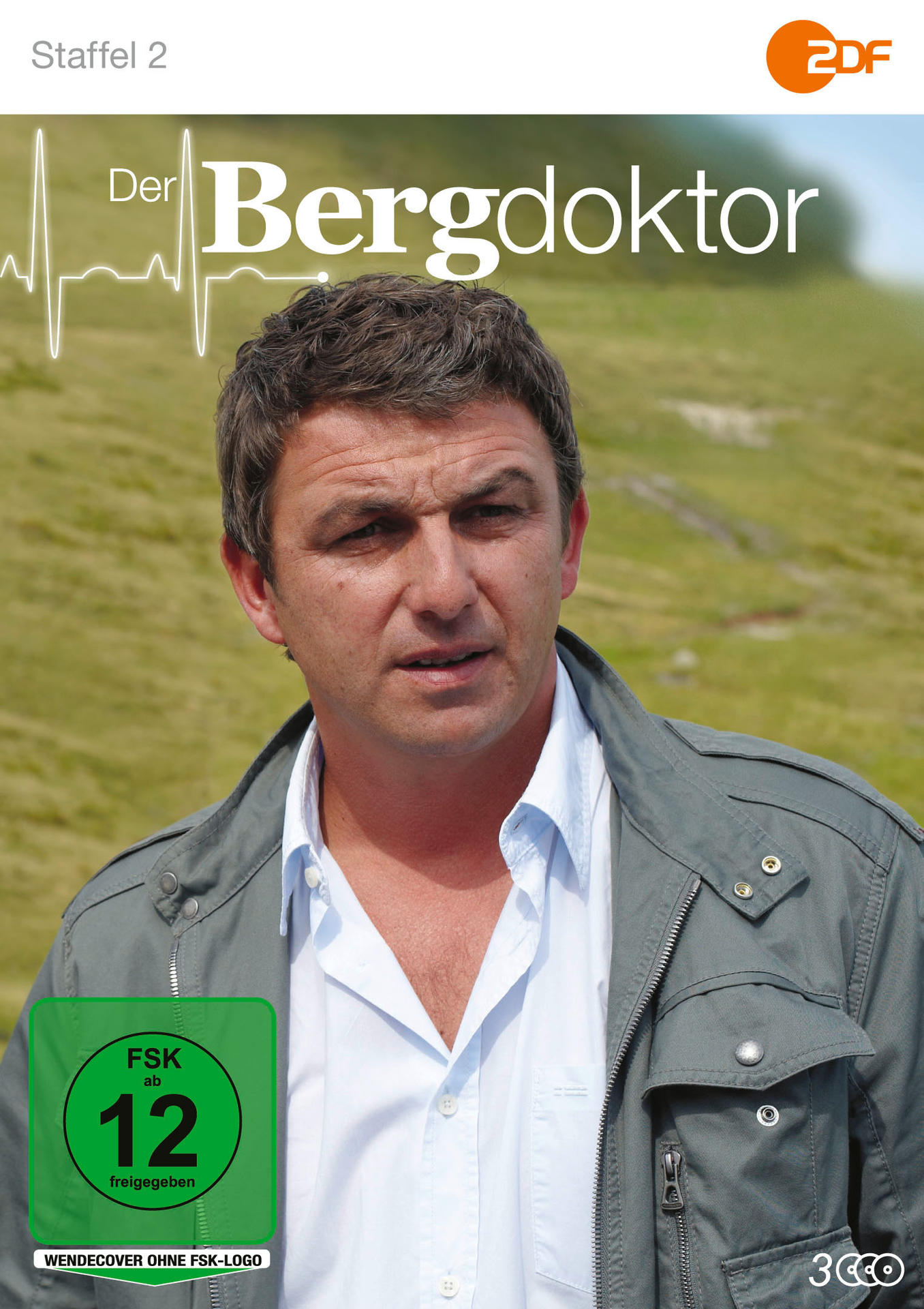 DVD-Hülle mit Gesicht eines Mannes und Bergkulisse.