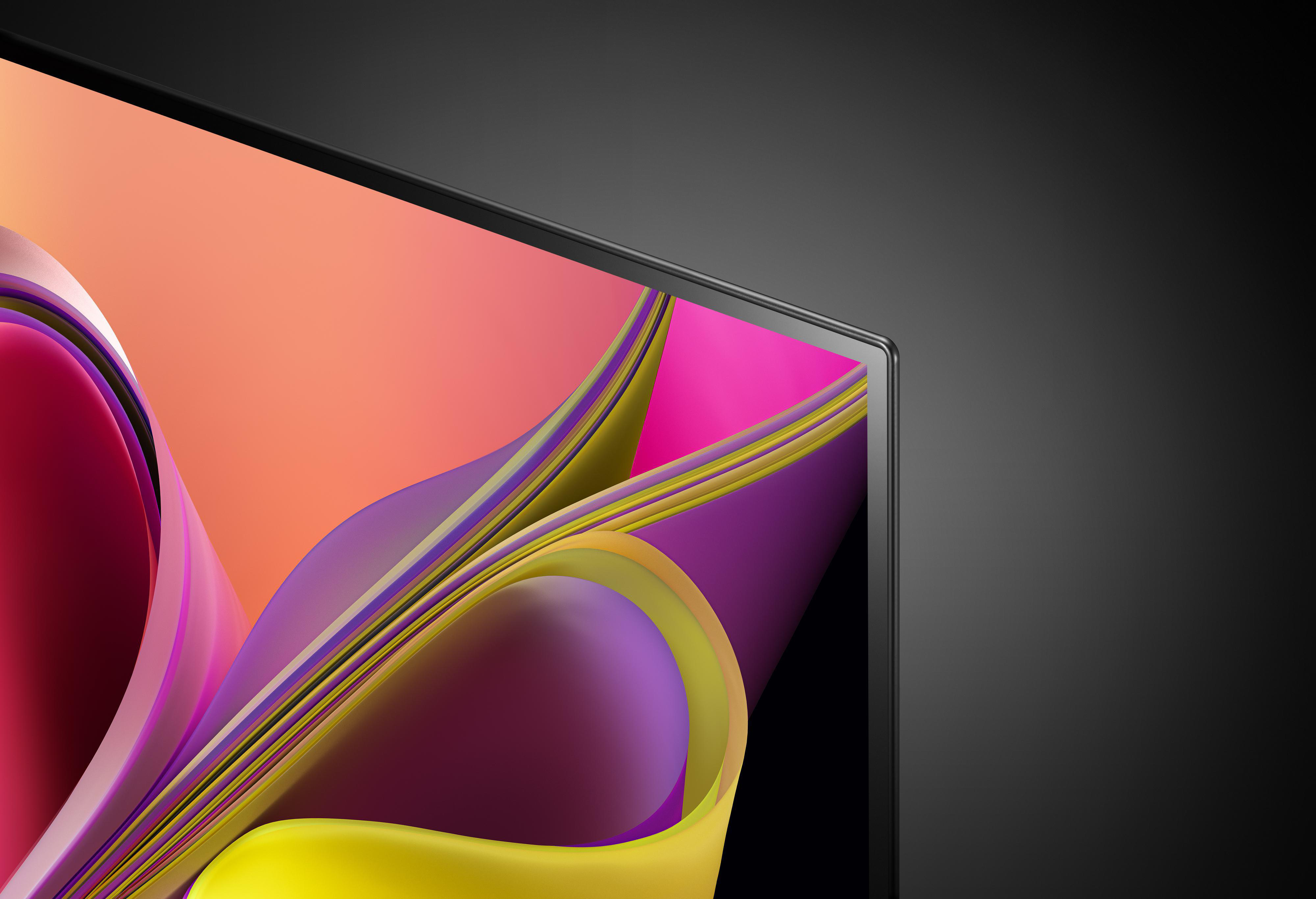 Nahaufnahme eines Bildschirms mit abstraktem, farbenfrohem Hintergrund.