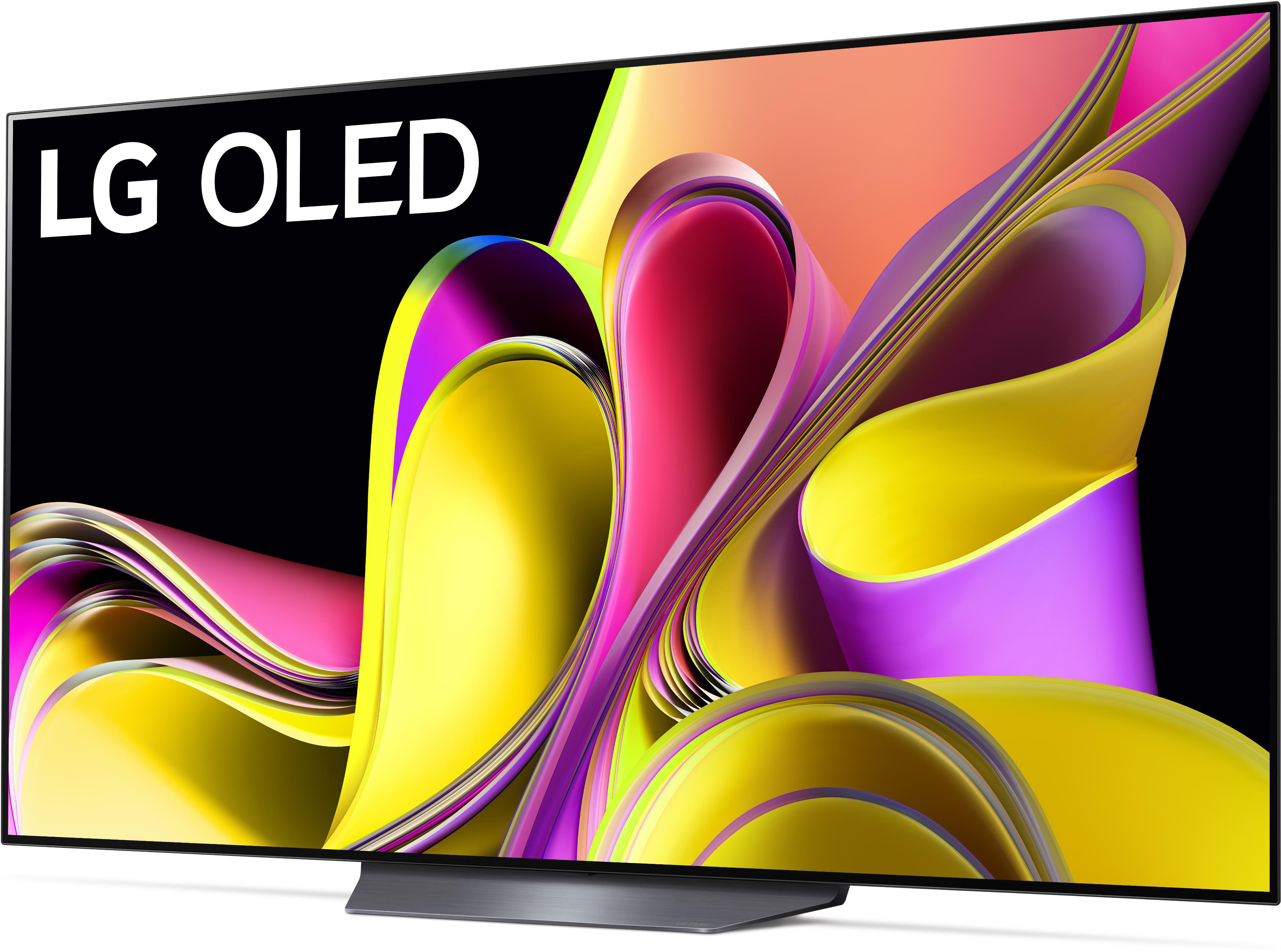 Ein LG OLED-Fernseher, der ein lebendiges, abstraktes Design in Gelb, Rosa und Lila zeigt.