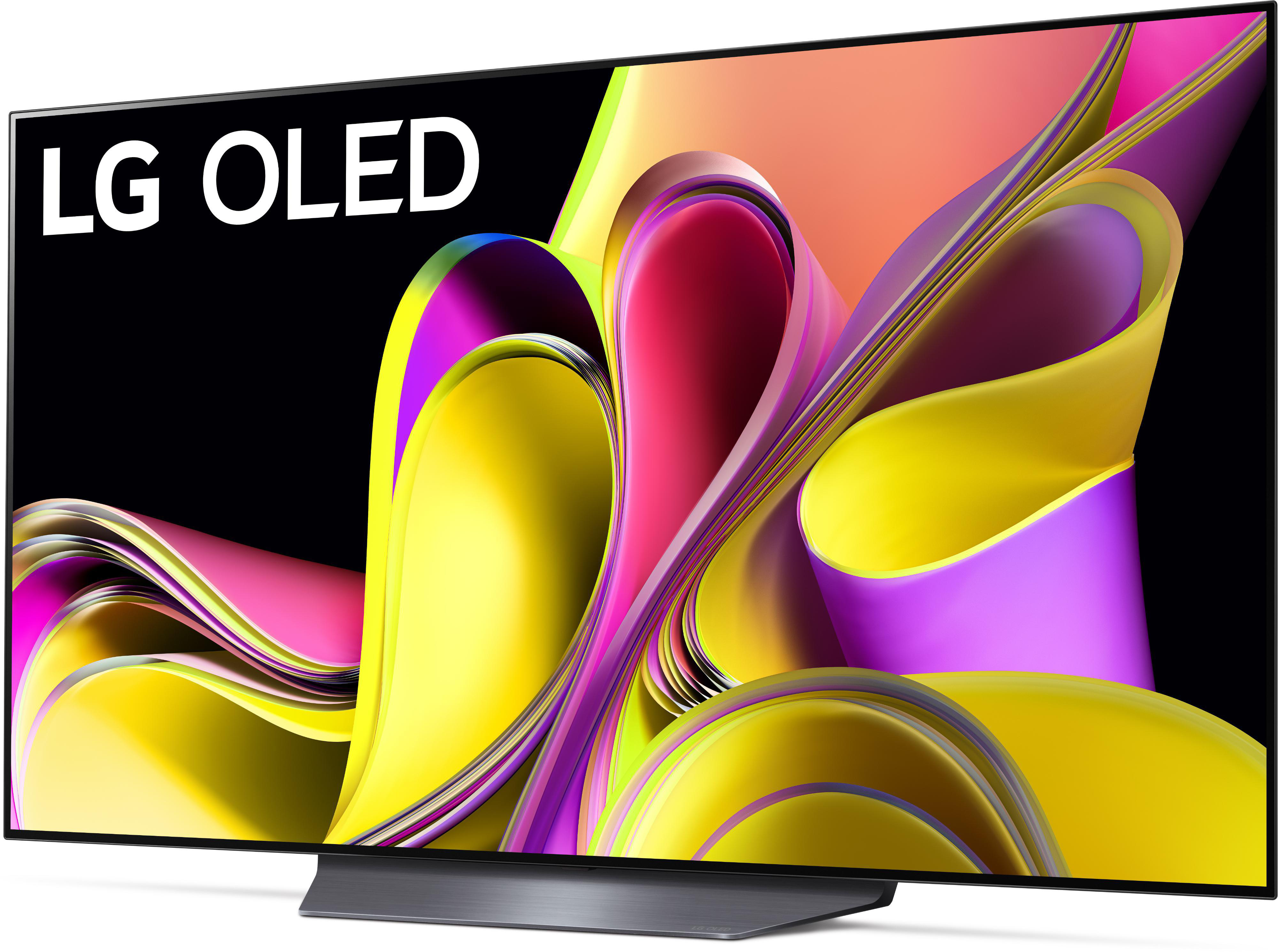 Ein moderner LG OLED-Fernseher mit bunten abstrakten Mustern auf schwarzem Hintergrund.