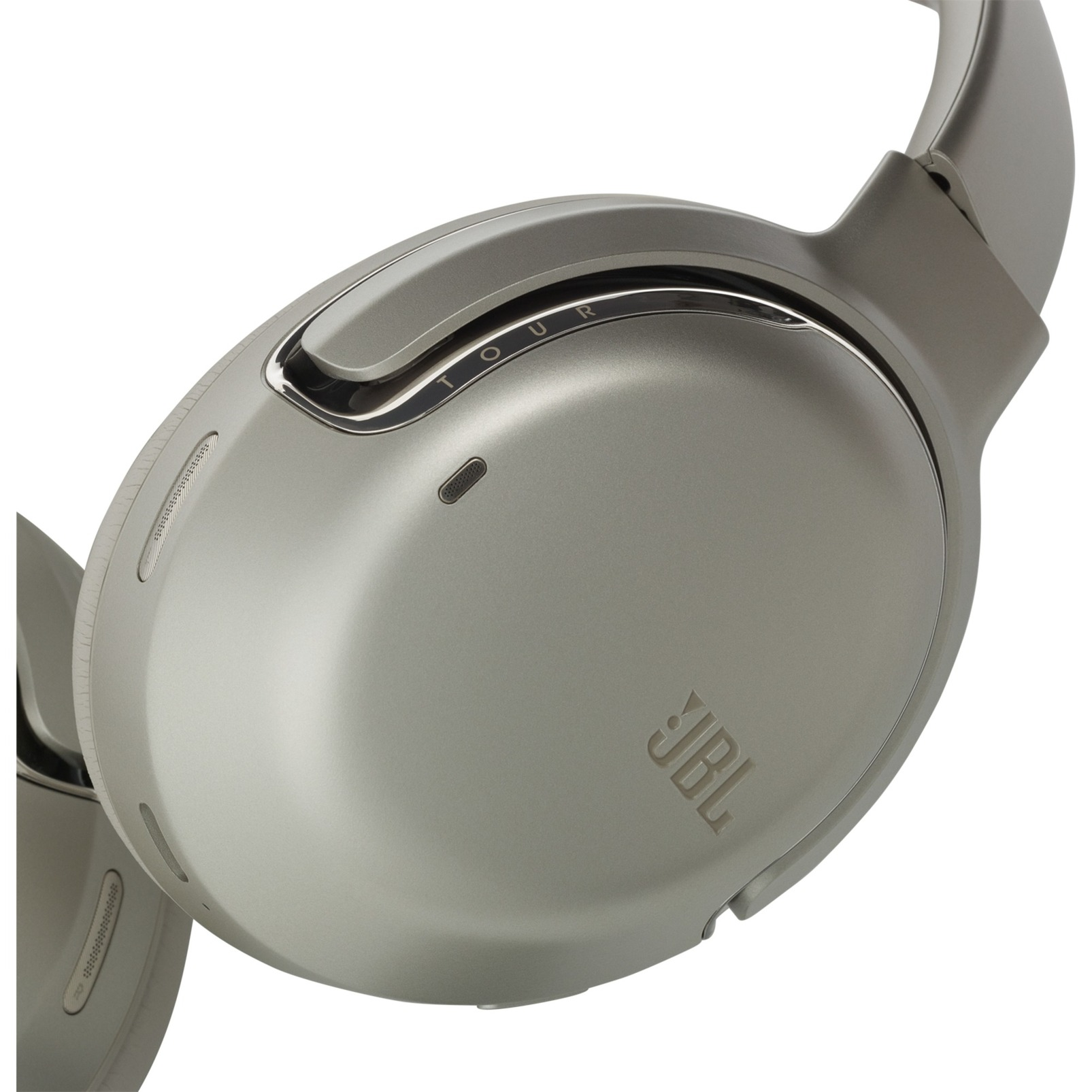 Primer plano de auriculares JBL grises. El logotipo de la marca es visible.