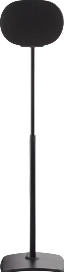 Un haut-parleur ovale noir sur un support haut et élancé à base plate.