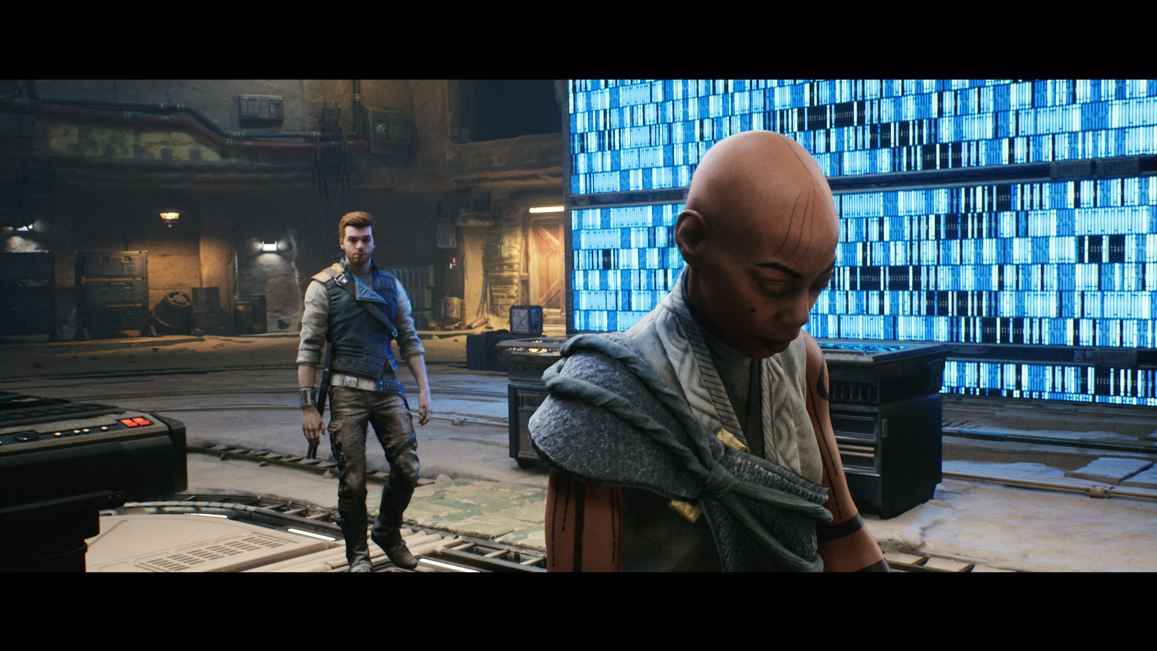 Szene aus einem Videospiel mit einem Mann im Vordergrund und einer Frau im Hintergrund.