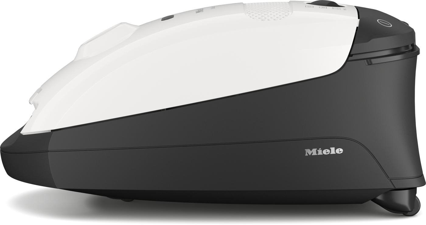 Ein weißer und schwarzer Staubsauger mit dem Markennamen Miele an der Seite.