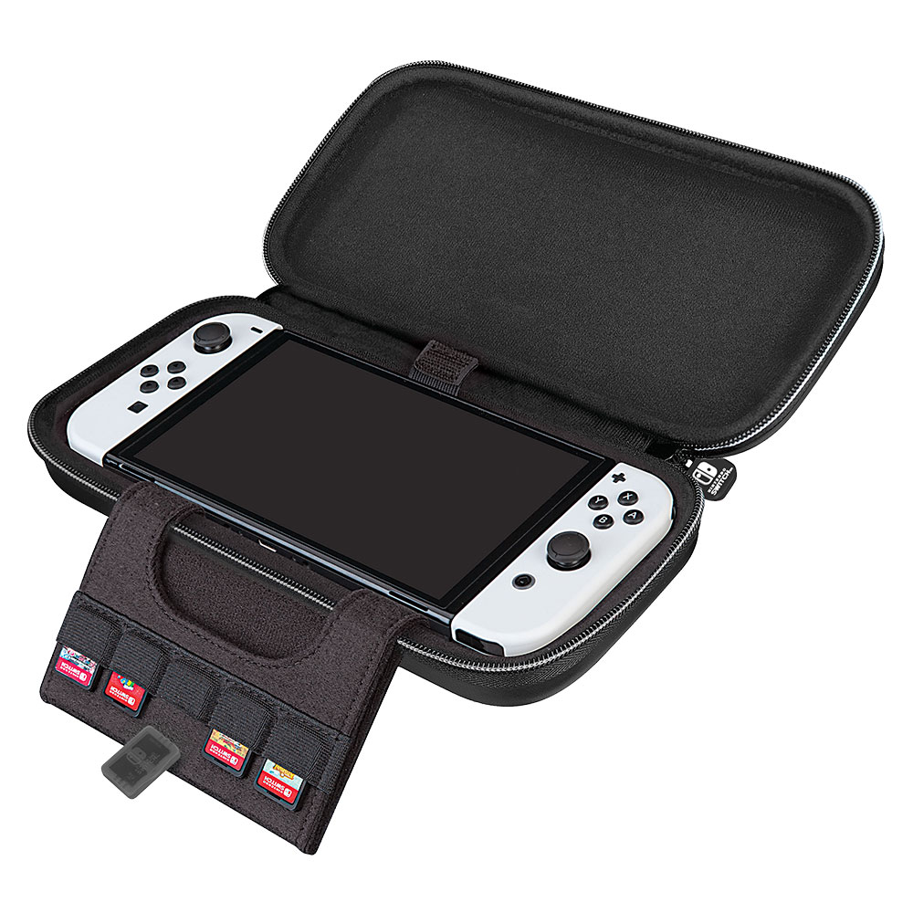 Consola Nintendo Switch en estuche negro con cartuchos de juego y soporte de cartuchos.