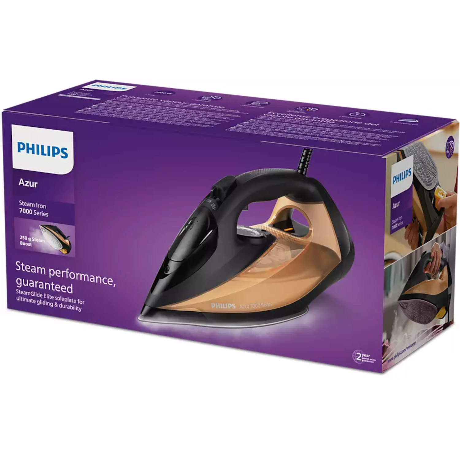 Iron in a box. Black and gold iron on the front. Purple and white box. Text.