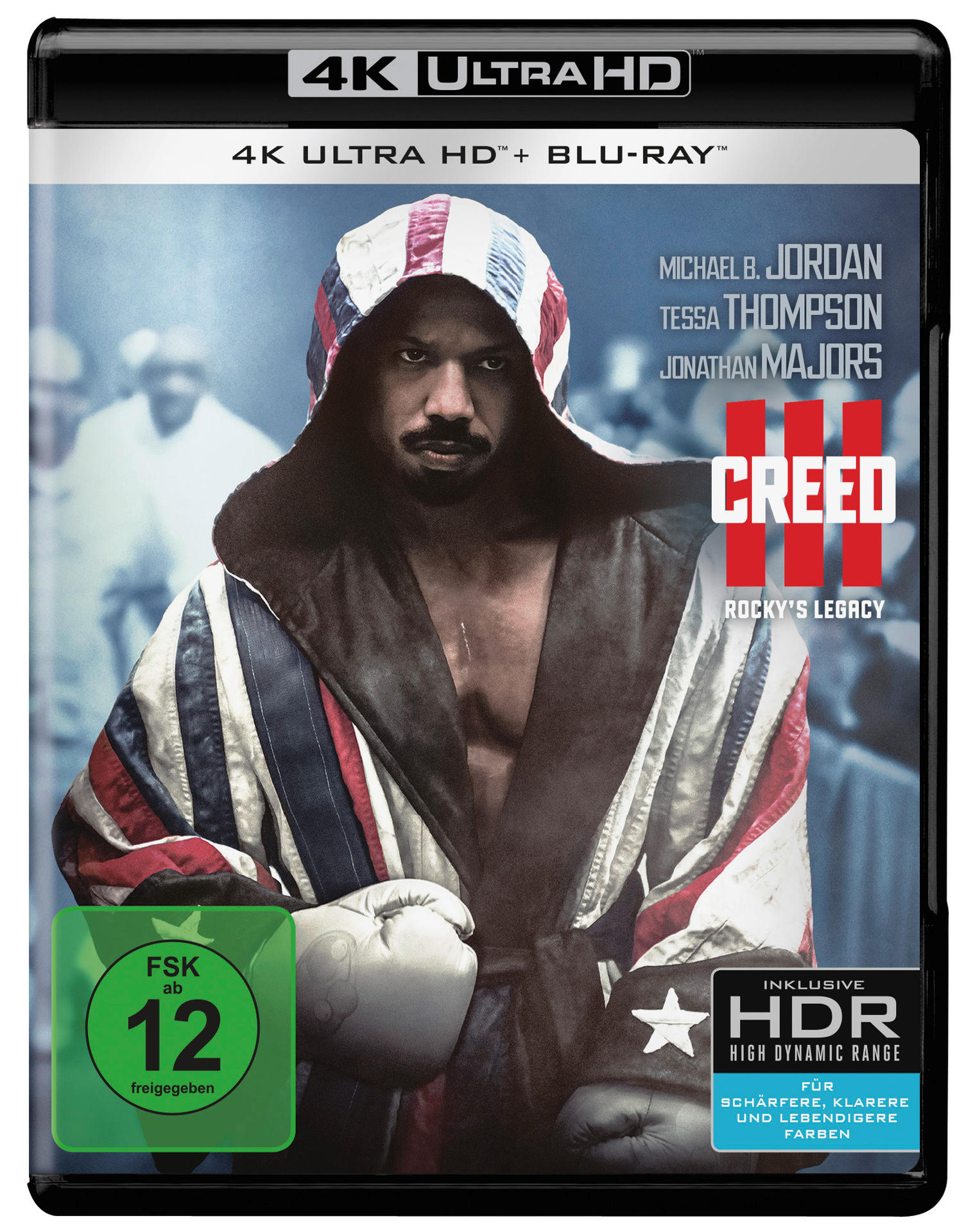 DVD-Cover, Michael B. Jordan im Boxmantel, Text: CREED III, Rocky's Legacy.