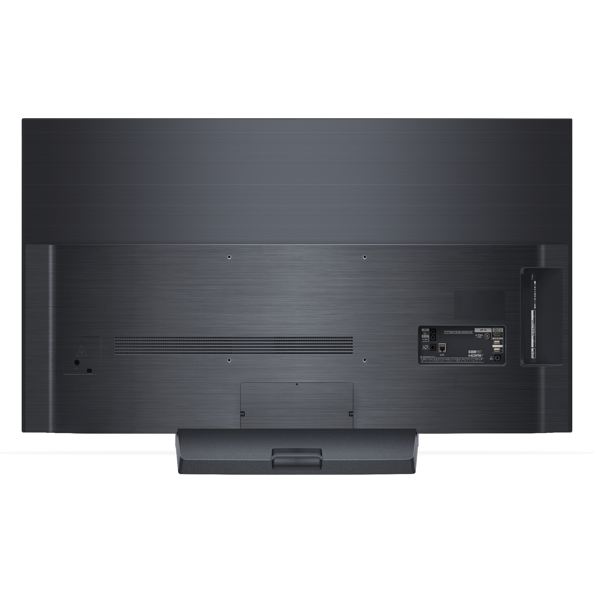 Parte trasera de un televisor negro con puertos y un soporte. Fondo blanco.