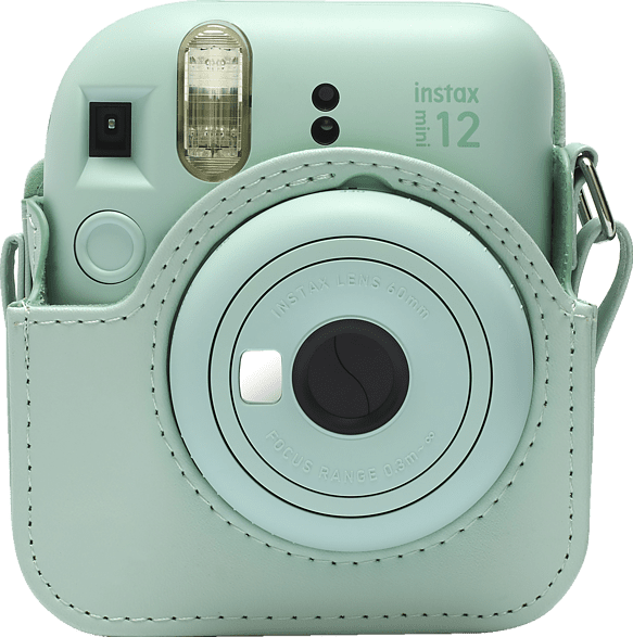 Mentazöld Instax Mini 12 kamera passzoló tokkal. A lencse fókuszban van.