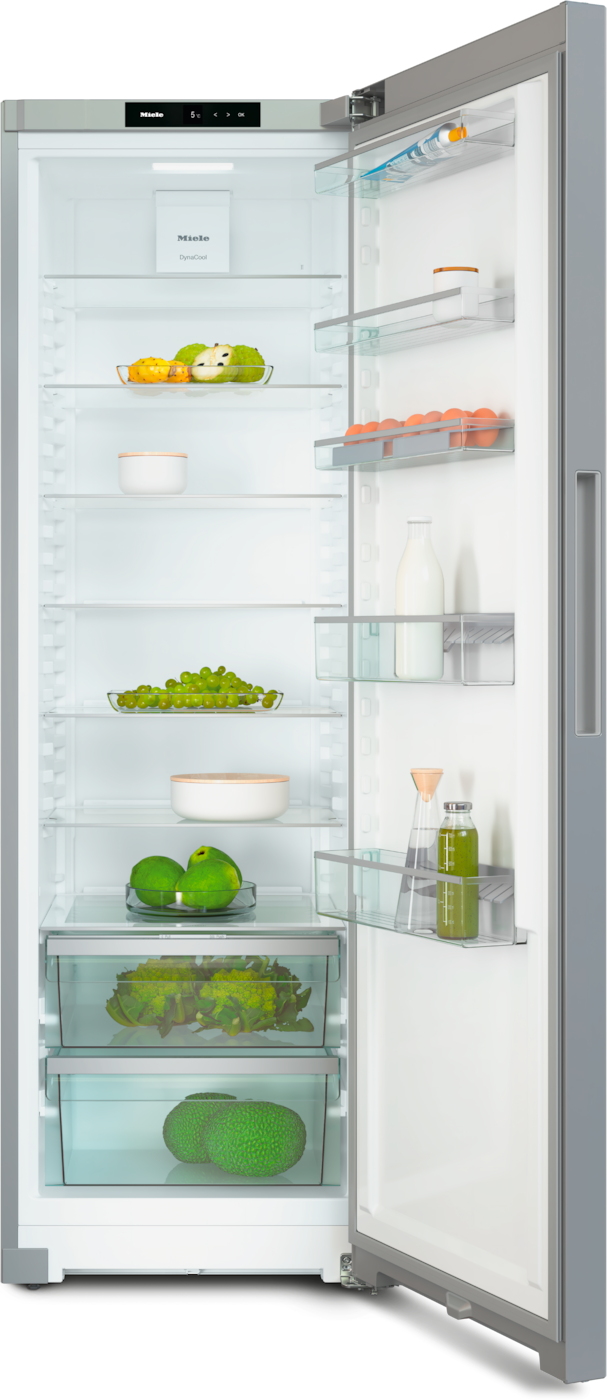 Ein offener Kühlschrank mit Obst, Gemüse und Eiern.