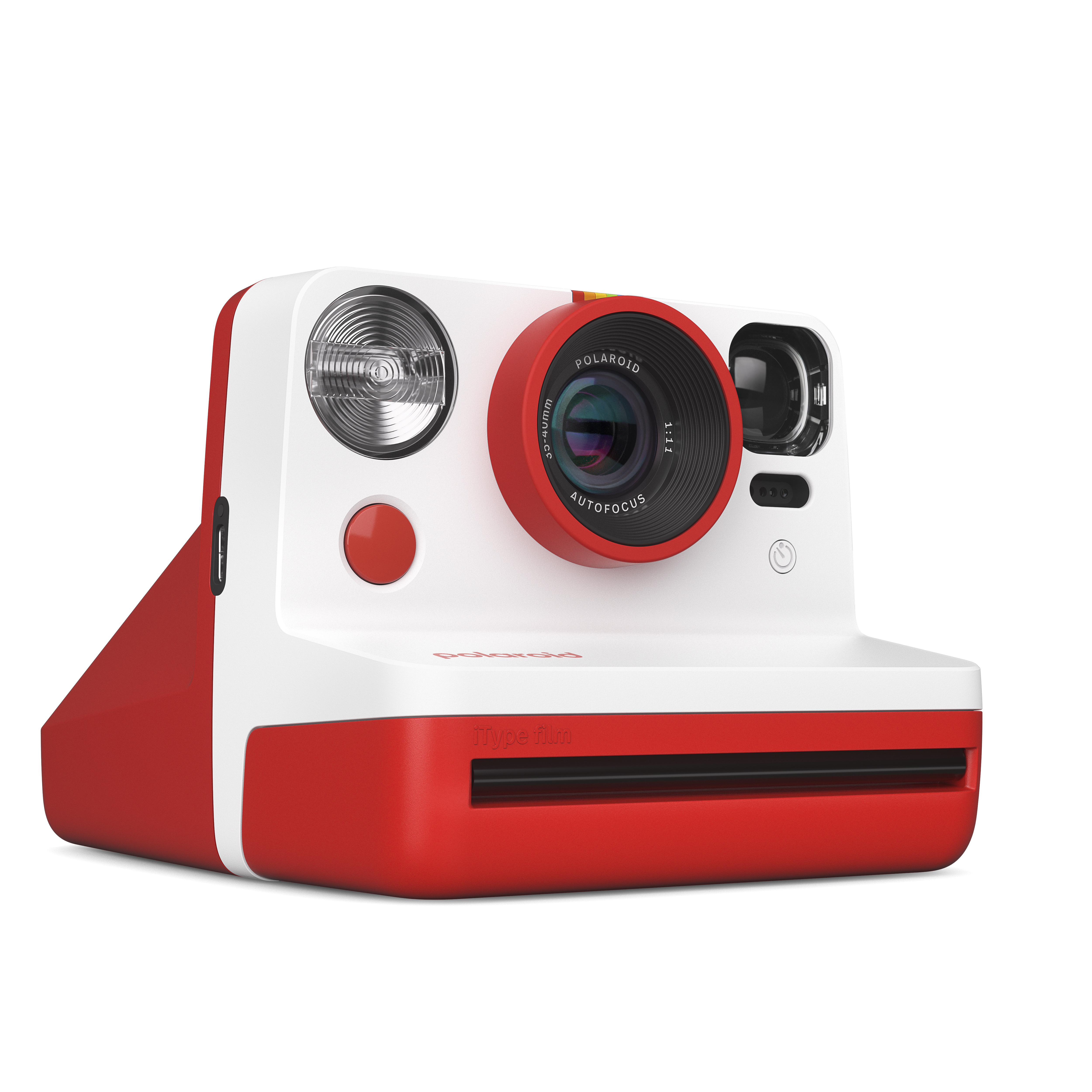 Rote und weiße Polaroid-Kamera mit rundem Objektiv und Blitz. Knöpfe an der Seite.