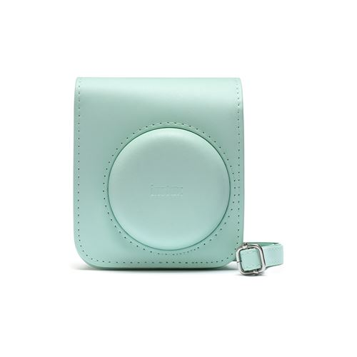 Una funda para cámara verde claro con diseño redondeado y correa.