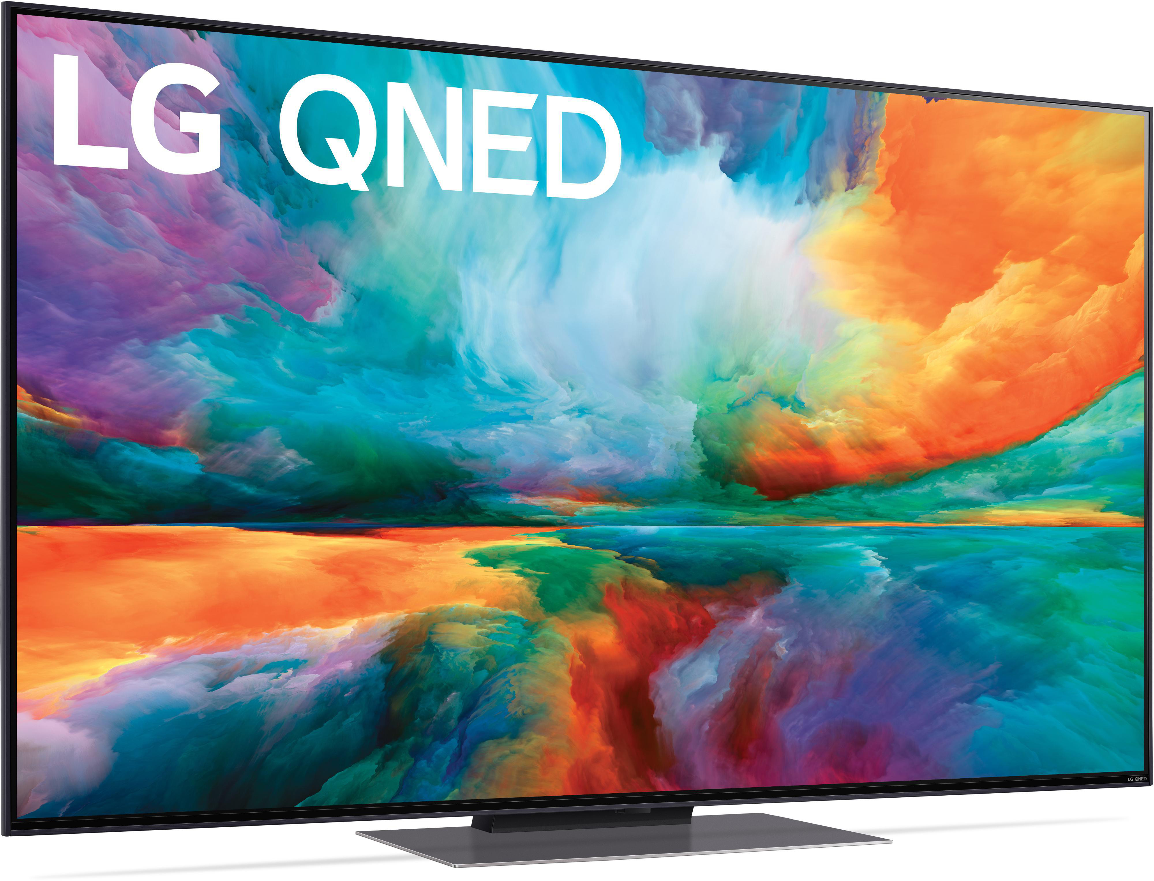 Großer LG QNED TV, der ein farbenfrohes abstraktes Bild auf einem Metallständer anzeigt.