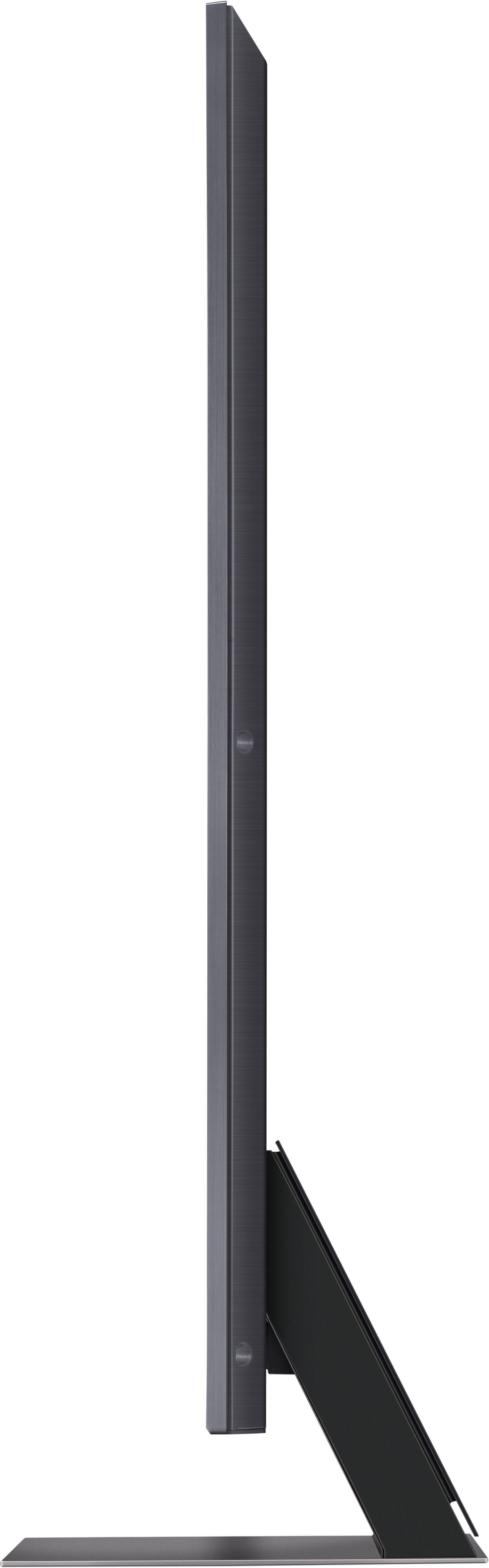 Seitenansicht eines LG-Fernsehers, schlankes Design, dunkelgraue Farbe, mit Ständer, auf weißem Hintergrund.