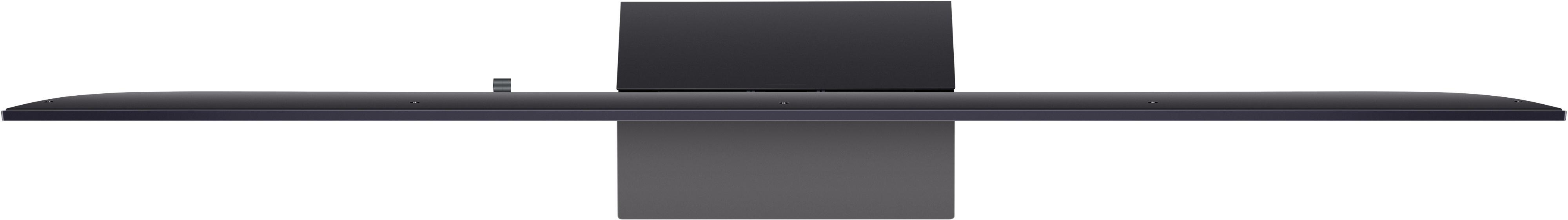 Ein schwarzer Fernseher von oben. Der Fernseher ist lang und dünn, mit einem rechteckigen Ständer.
