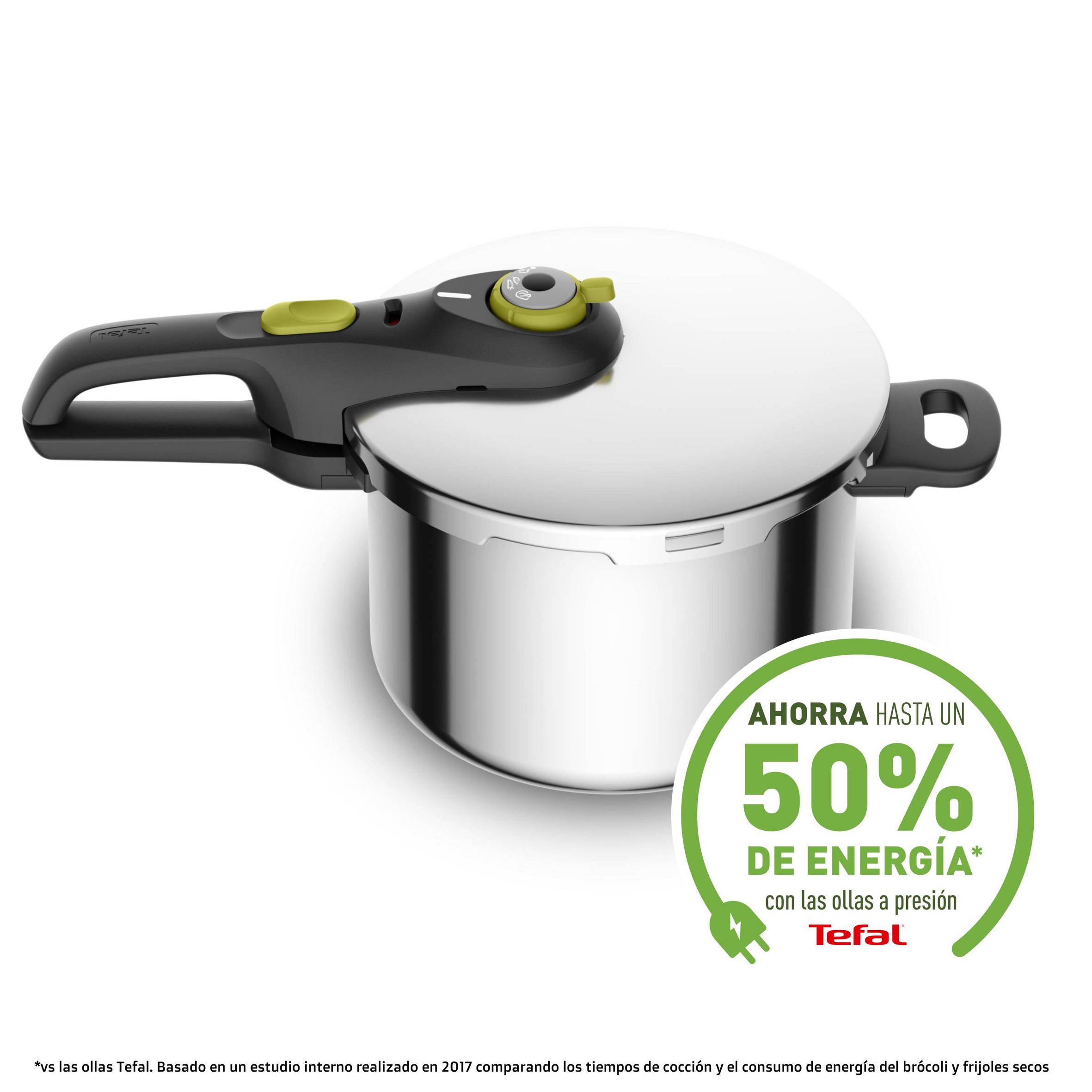 Una olla a presión de acero inoxidable con un asa negra y una tapa blanca. Tiene una etiqueta verde.
