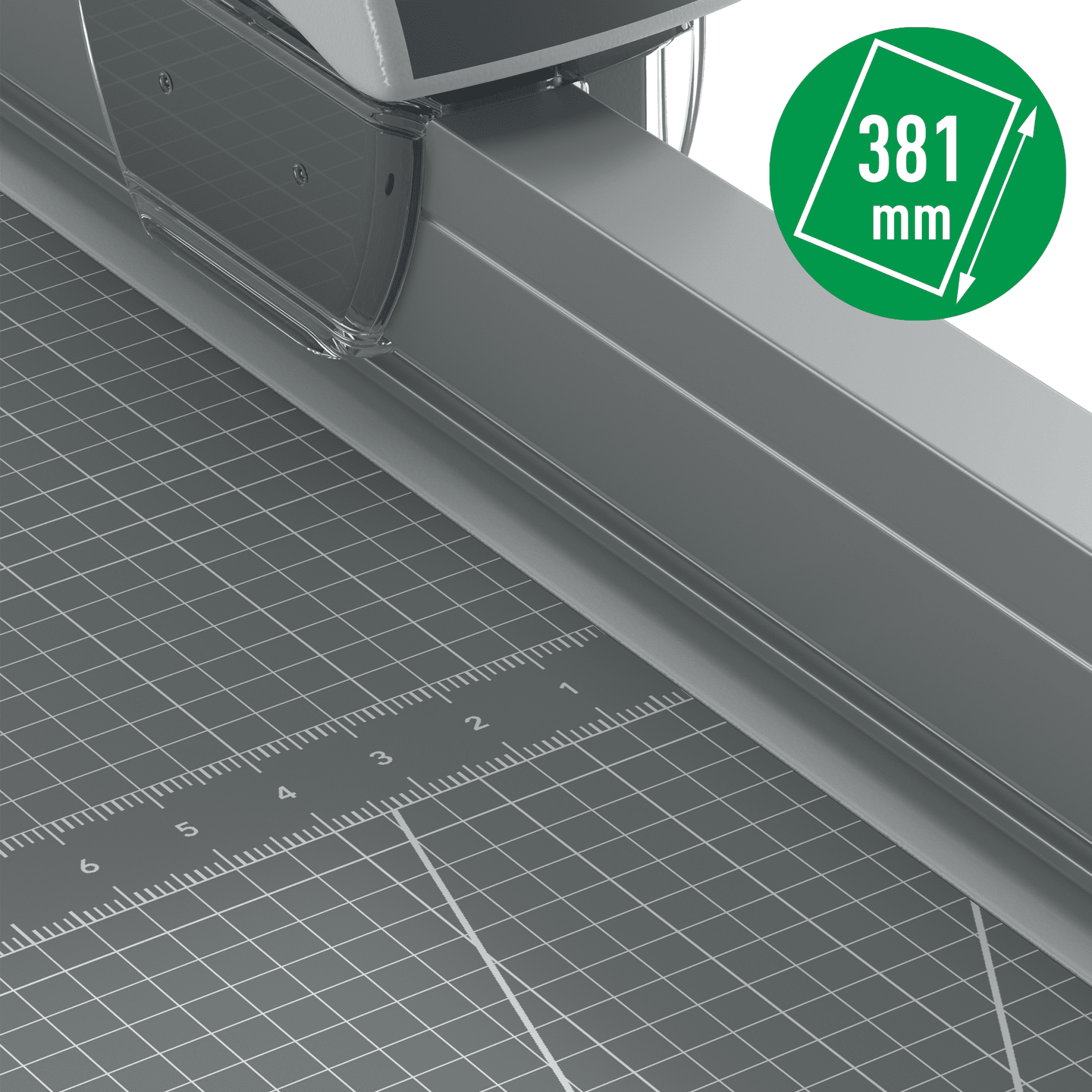 Szürke papírvágó vonalzó jelölésekkel és egy zöld körrel, 381 mm-es méréssel.