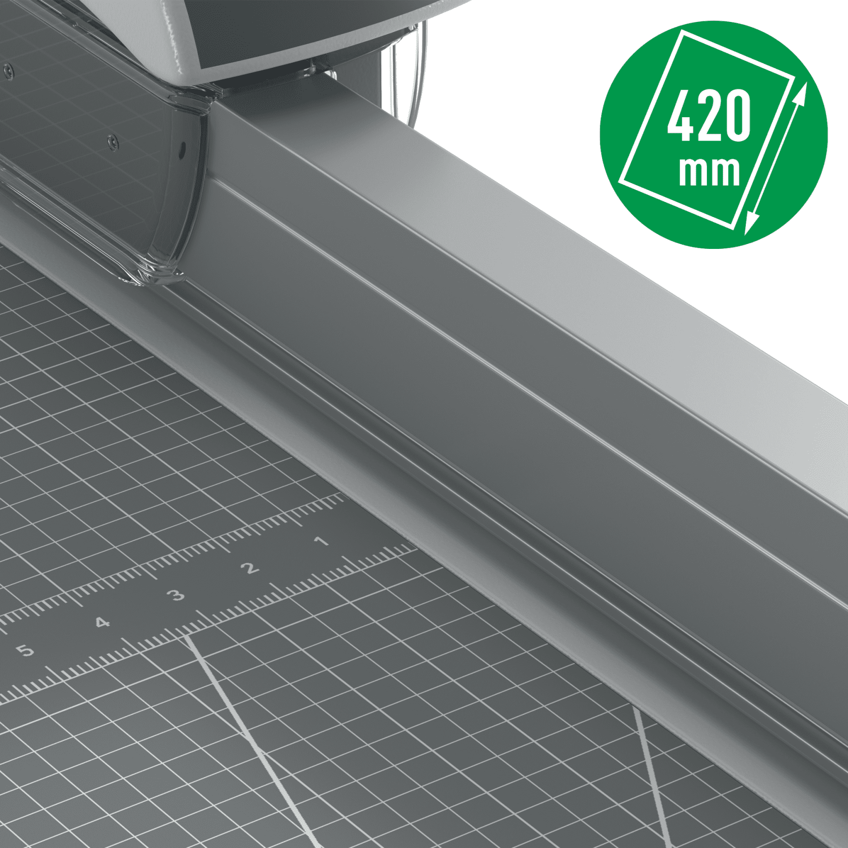 Szürke papírvágó rácsszőnyeggel. Egy zöld címke a '420 mm'-t mutatja.