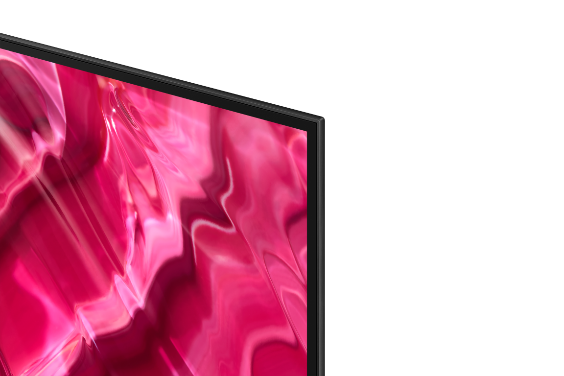 Pembe ve kırmızı soyut bir desenle bir TV ekranının yakın çekimi. TV çerçevesi siyahtır.