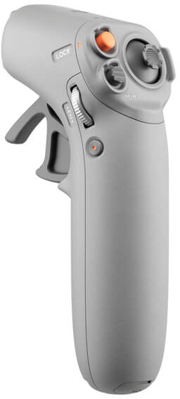 Ein grauer Gamecontroller mit mehreren Tasten und einem Auslöser.