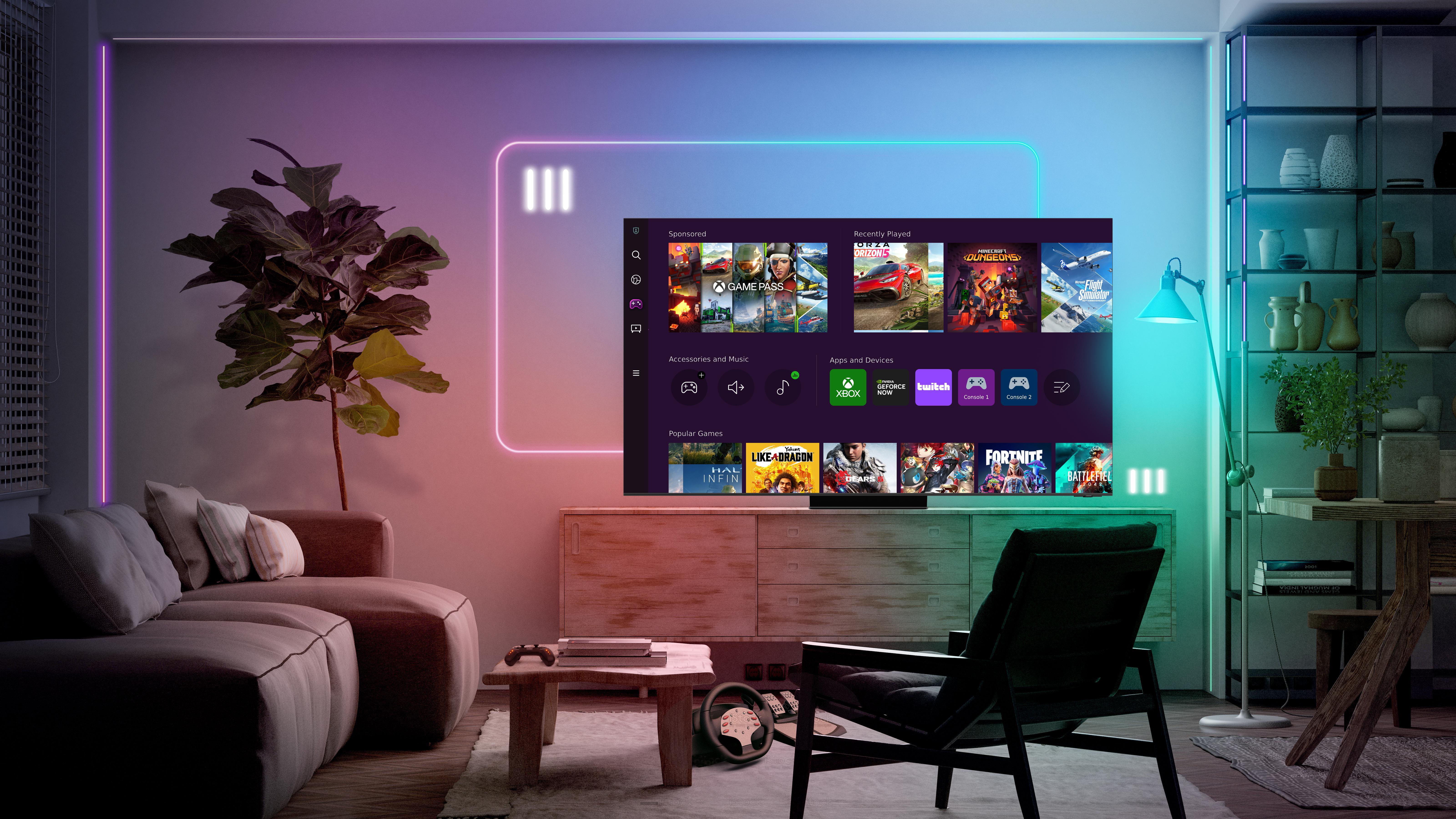 Ein Wohnzimmer mit Fernseher und farbenfroher Umgebungsbeleuchtung.