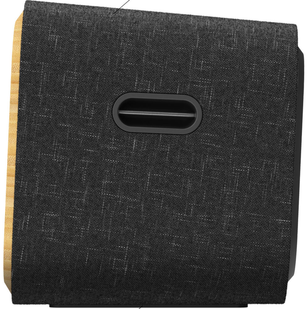A black speaker with a fabric cover and a wooden side. It has an oval-shaped vent and a logo.