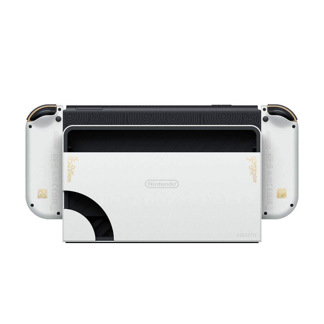 Consola Nintendo Switch, blanca con detalles dorados. Joy-Cons desmontados. Vista trasera con puertos y detalles de diseño.