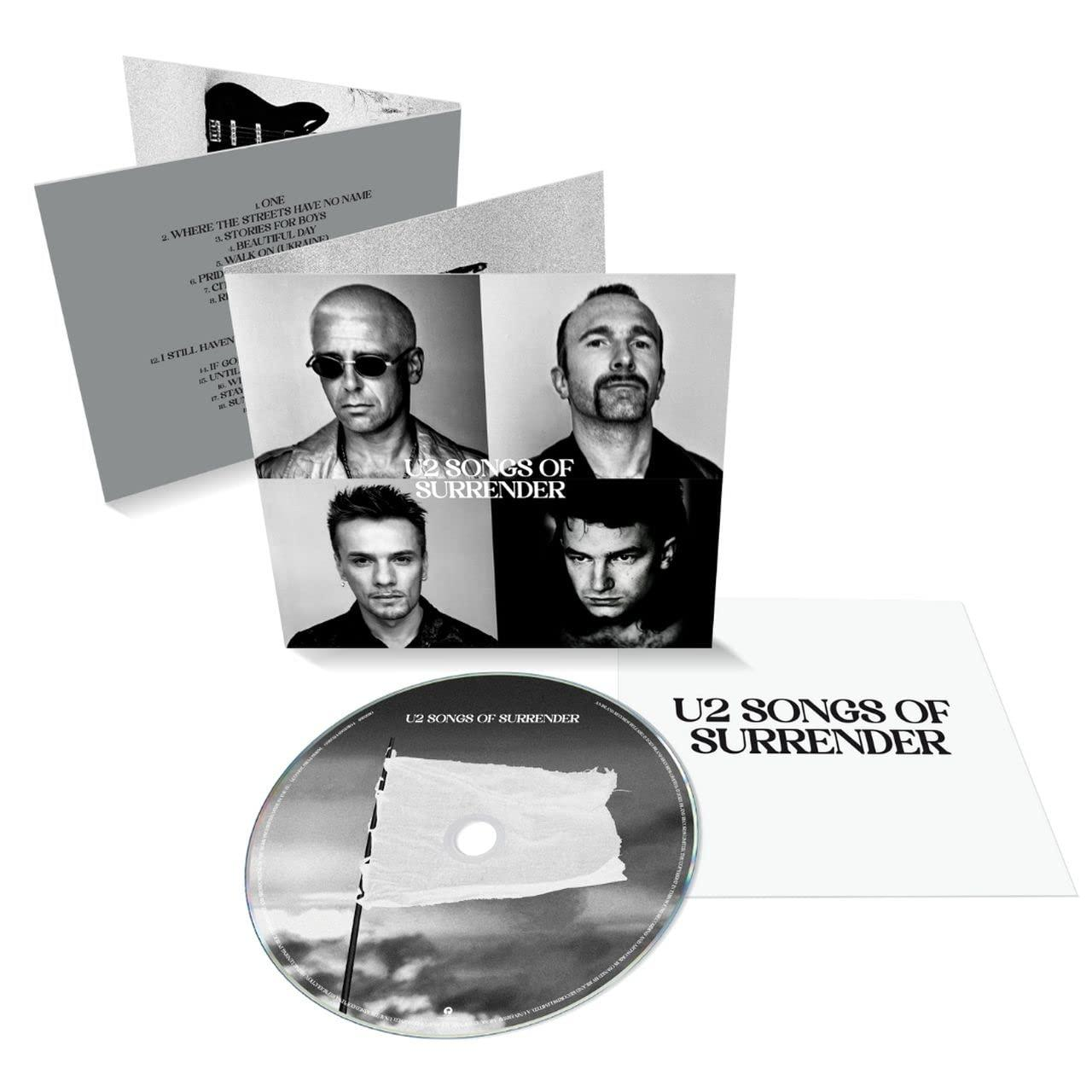 Az U2 album borítója és CD-je. A borítón a zenekar fotói és az album címe látható.