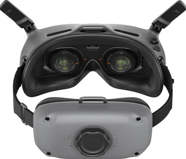 Casque VR, gris et noir avec un cadran et du texte à l'avant.