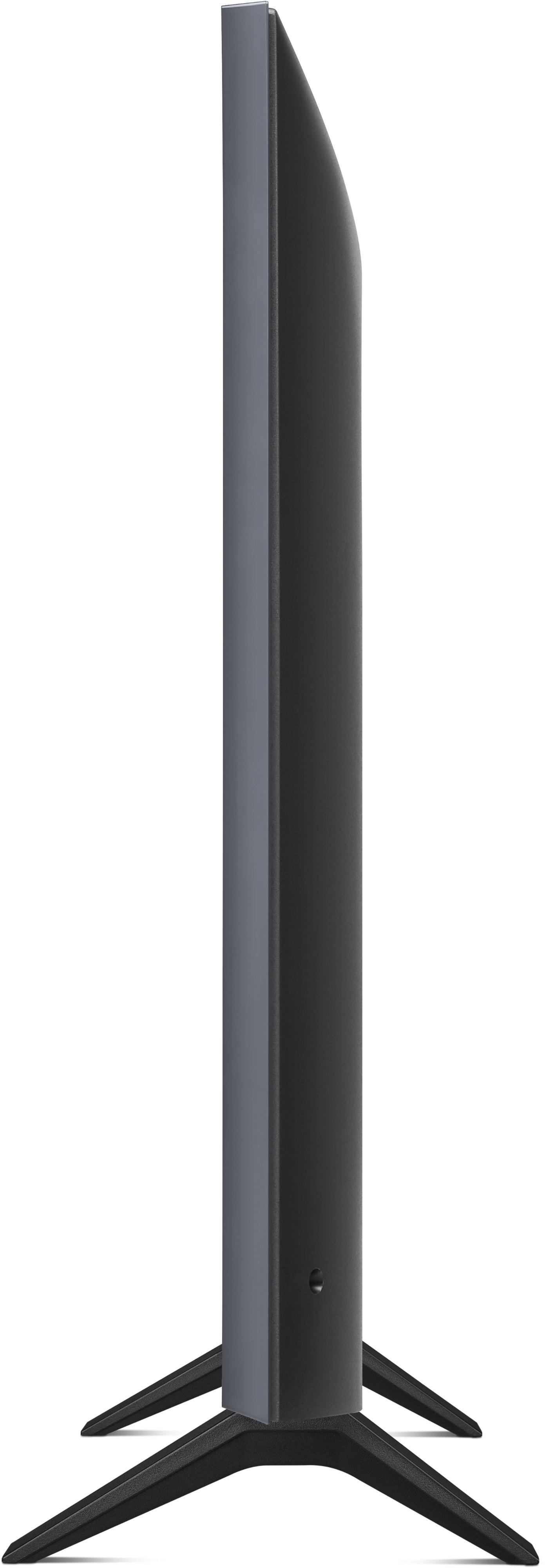 Seitenansicht eines schwarzen Fernsehers mit Ständer, der ein schlankes Profil vor weißem Hintergrund zeigt.