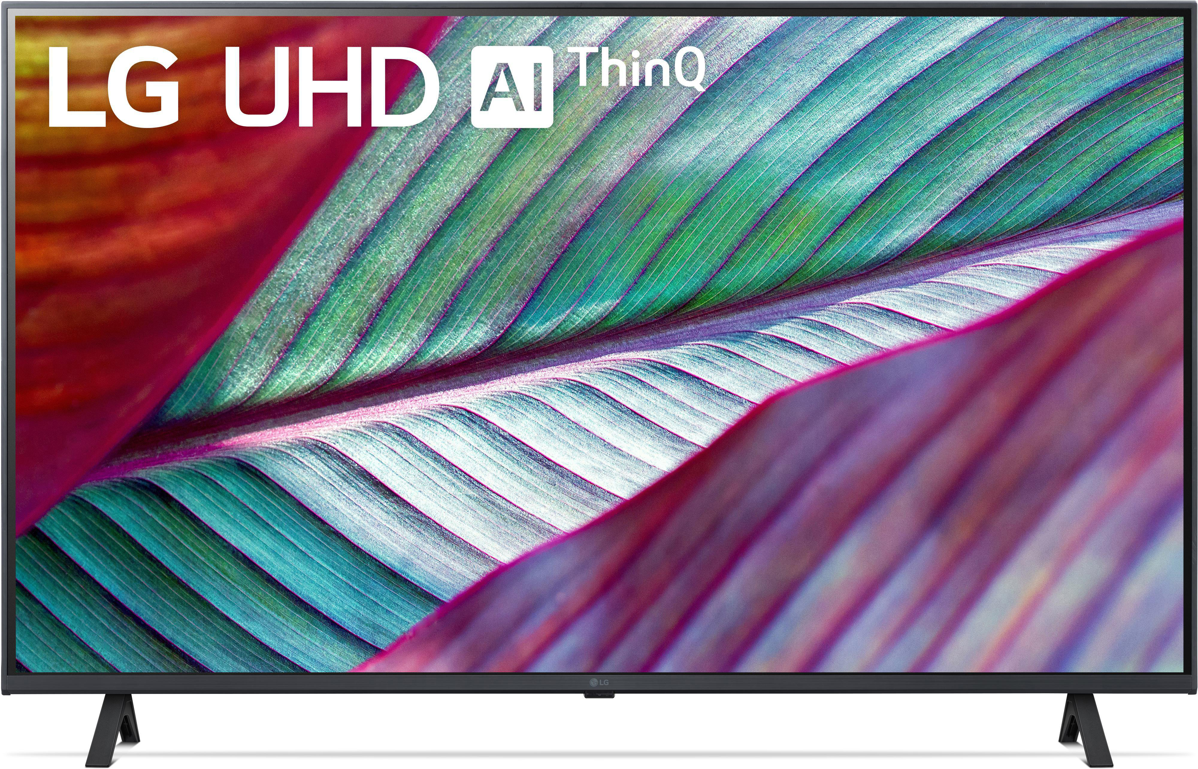 LG UHD AI ThinQ TV, die eine Nahaufnahme von bunten Blättern zeigt, rot, grün und lila.