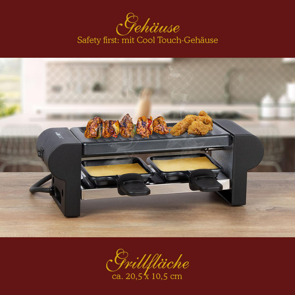 Raclette-Grill mit Essen. Zwei Tabletts mit geschmolzenem Käse.