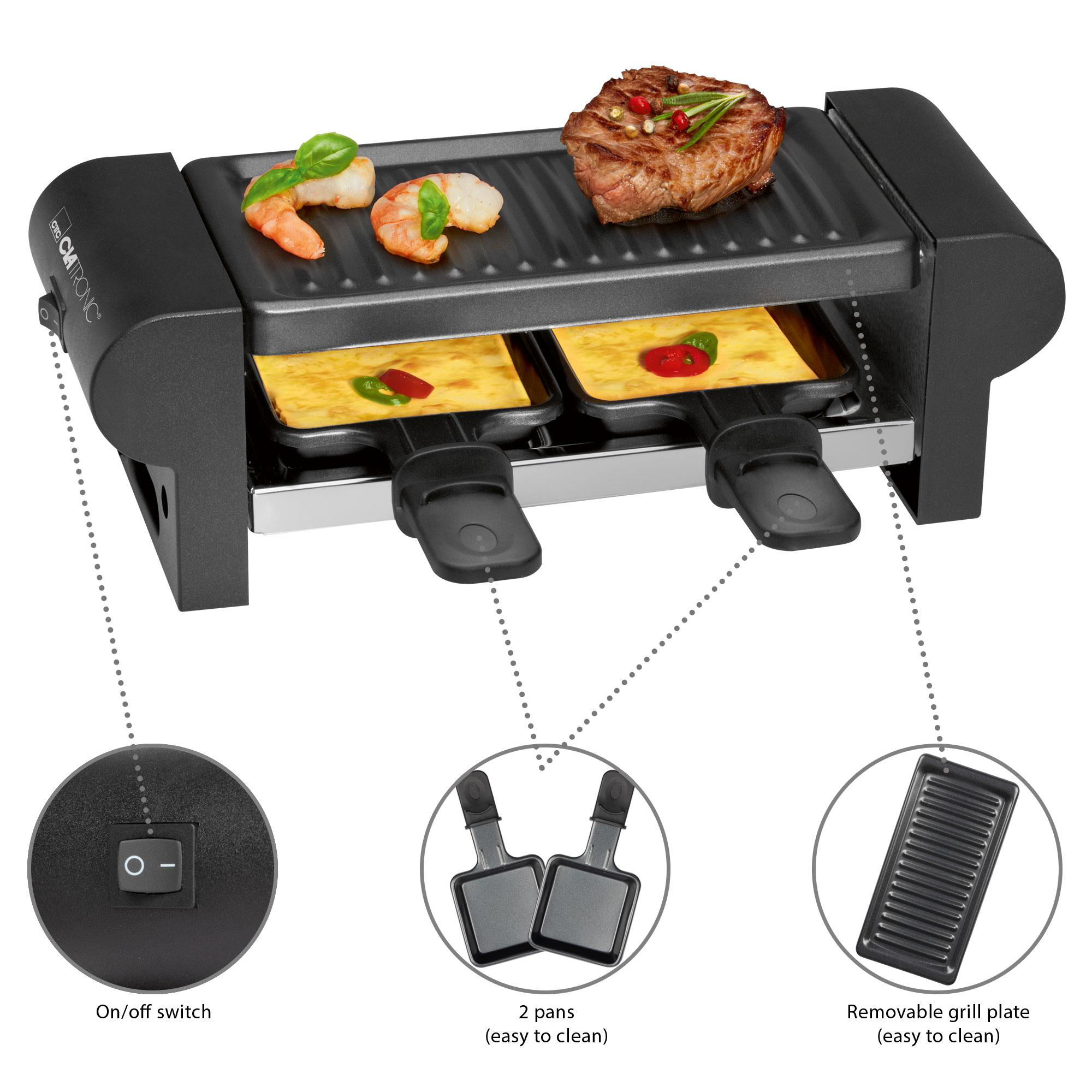 Ein elektrischer Grill mit Essen darauf. Es gibt zwei Pfannen mit Käse sowie Garnelen und Steak.