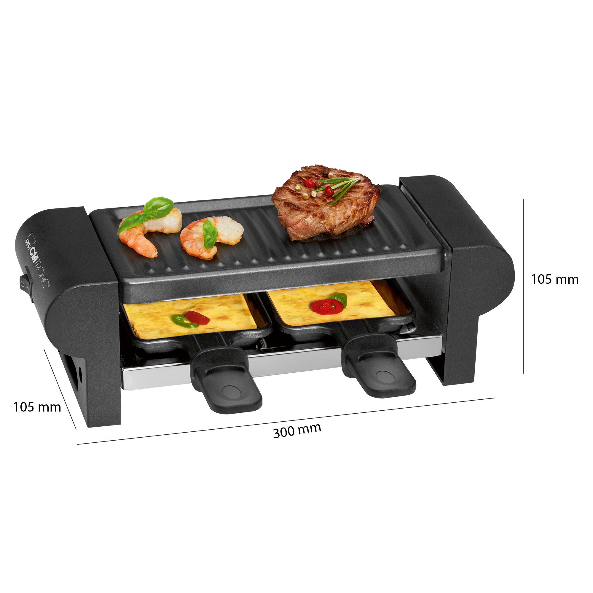 Ein Raclette-Grill mit gekochtem Essen, darunter Fleisch, Garnelen und Käse.