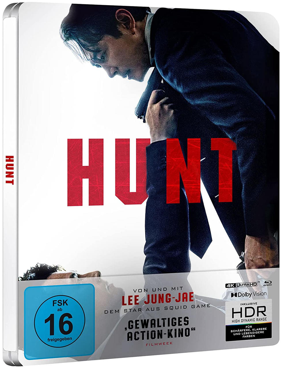 Filmcover mit einem Mann im Anzug und dem Wort 'HUNT' in Rot, weißer Hintergrund.