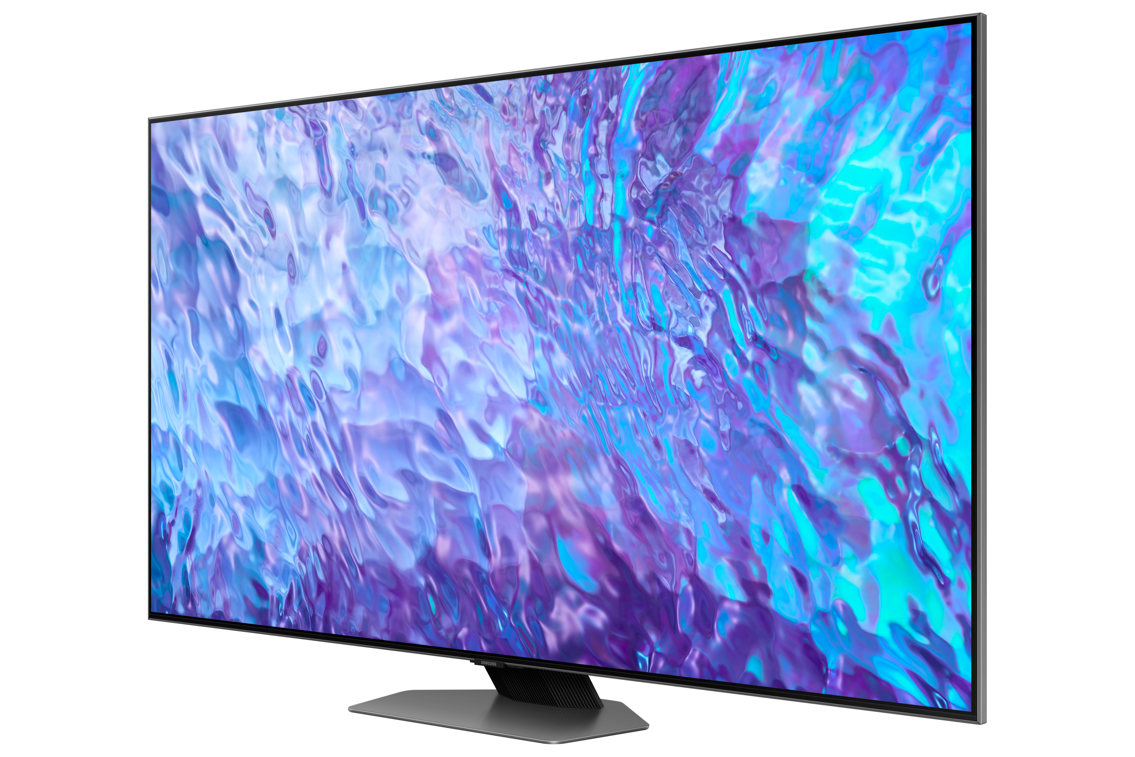 Ein großer, flacher, schwarzer Fernseher mit einem silbernen Ständer. Der Bildschirm zeigt ein buntes Bild.
