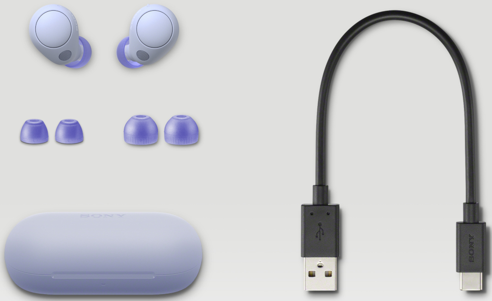 Écouteurs Sony violets clairs, étui de chargement et embouts supplémentaires, avec un câble USB-C.