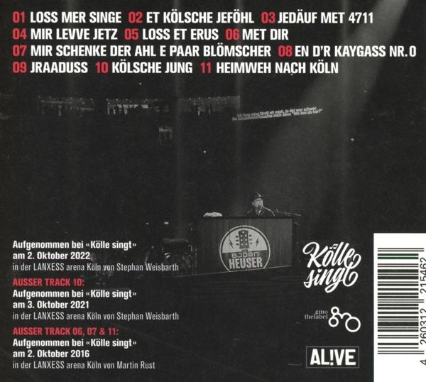 Ein schwarz-weißes Albumcover mit deutschem Text und einem Bild eines Mannes auf der Bühne.