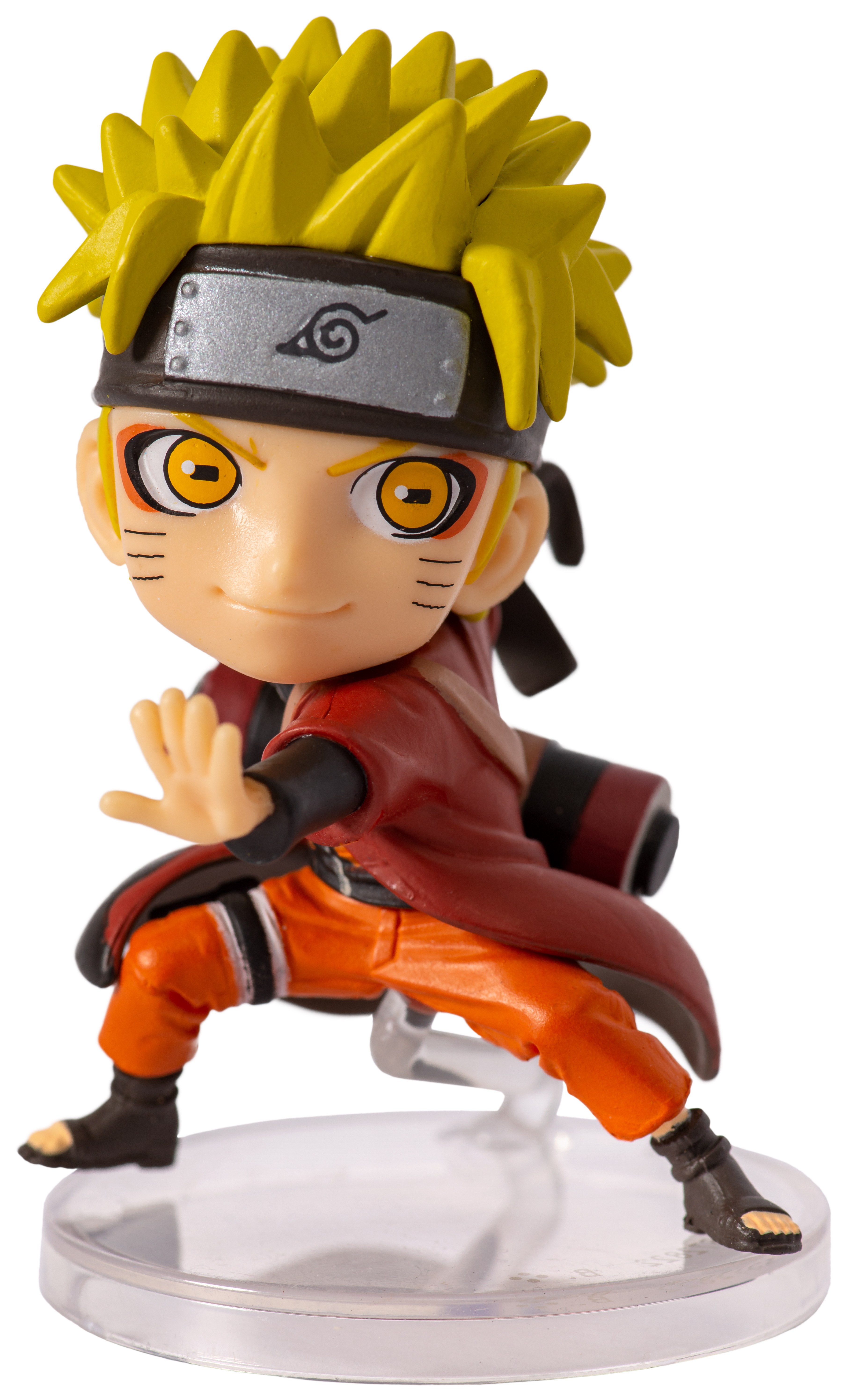 Naruto-Figur in Actionpose. Er trägt orangefarbene und rote Kleidung mit gelber Frisur.
