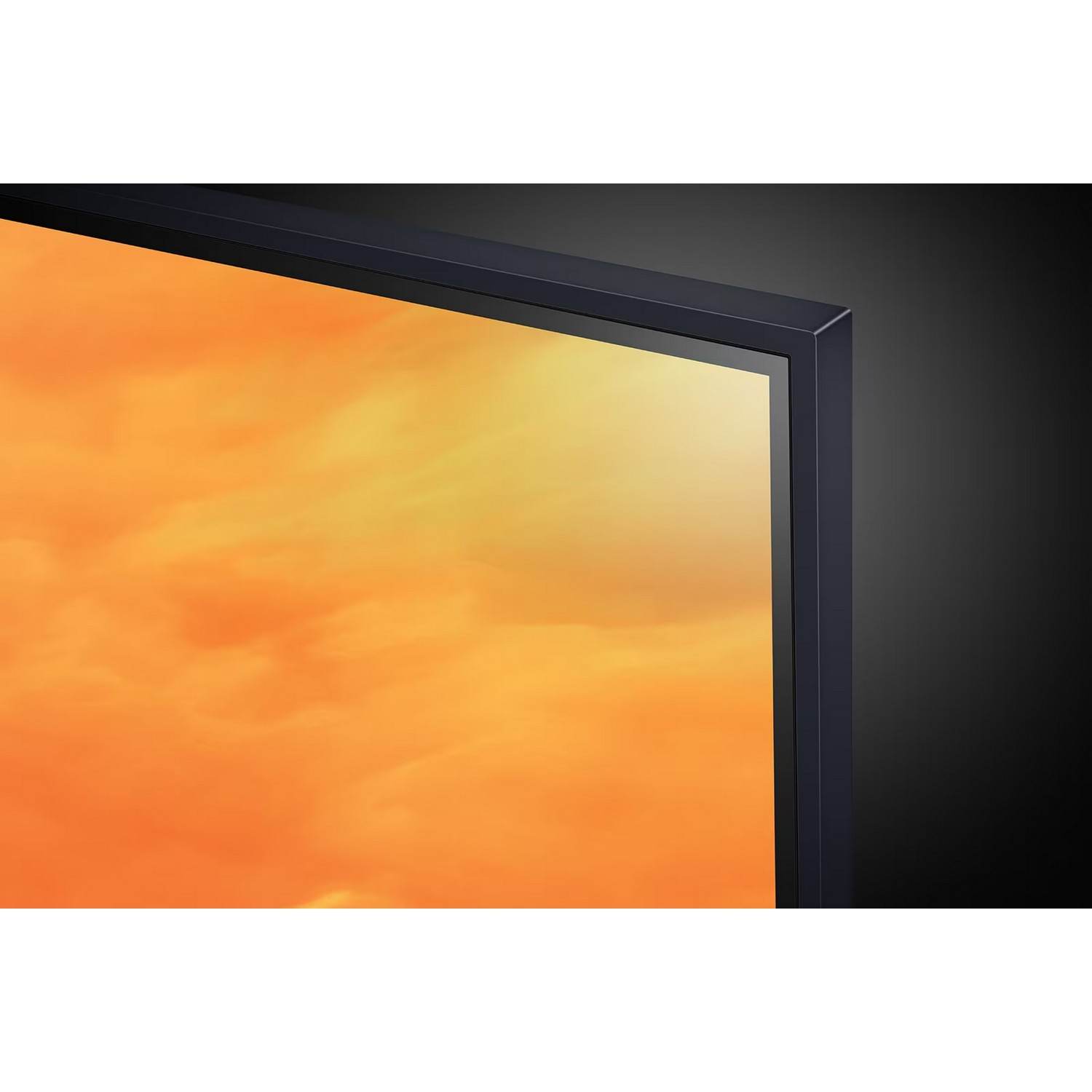 Gros plan d'un moniteur avec une image orange semblable à un ciel, le cadre noir de l'écran est visible.