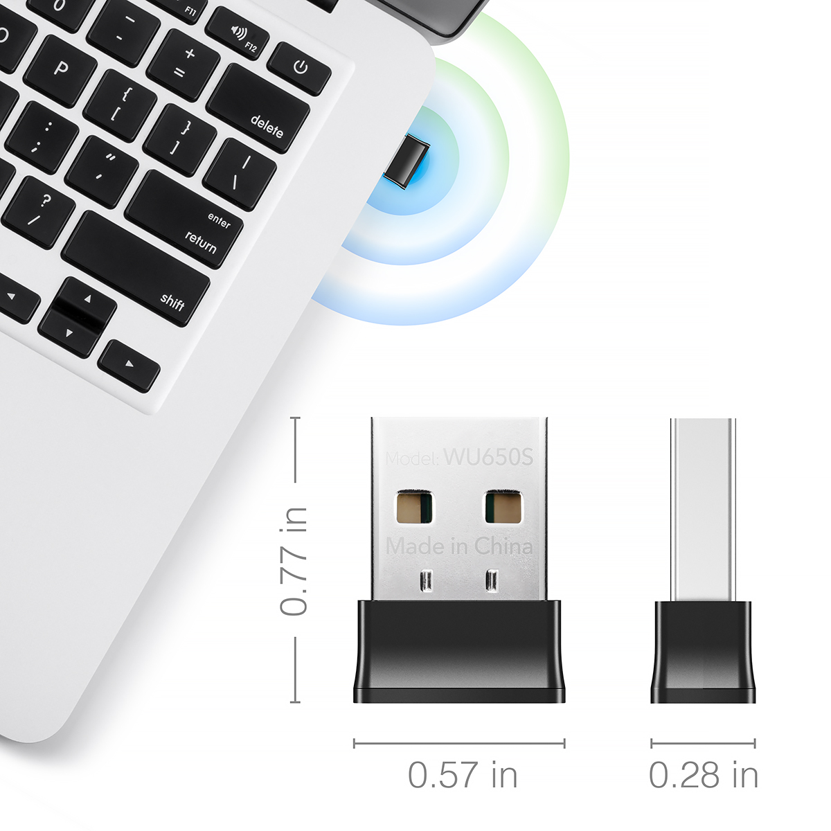 USB-adapter egy laptop billentyűzete mellett, méretek: 0,77 hüvelyk, 0,57 hüvelyk és 0,28 hüvelyk. WU650S feliratú adapter, Made in China.