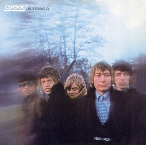 A Rolling Stones album borítója. A zenekar elmosódott fa háttér előtt áll.