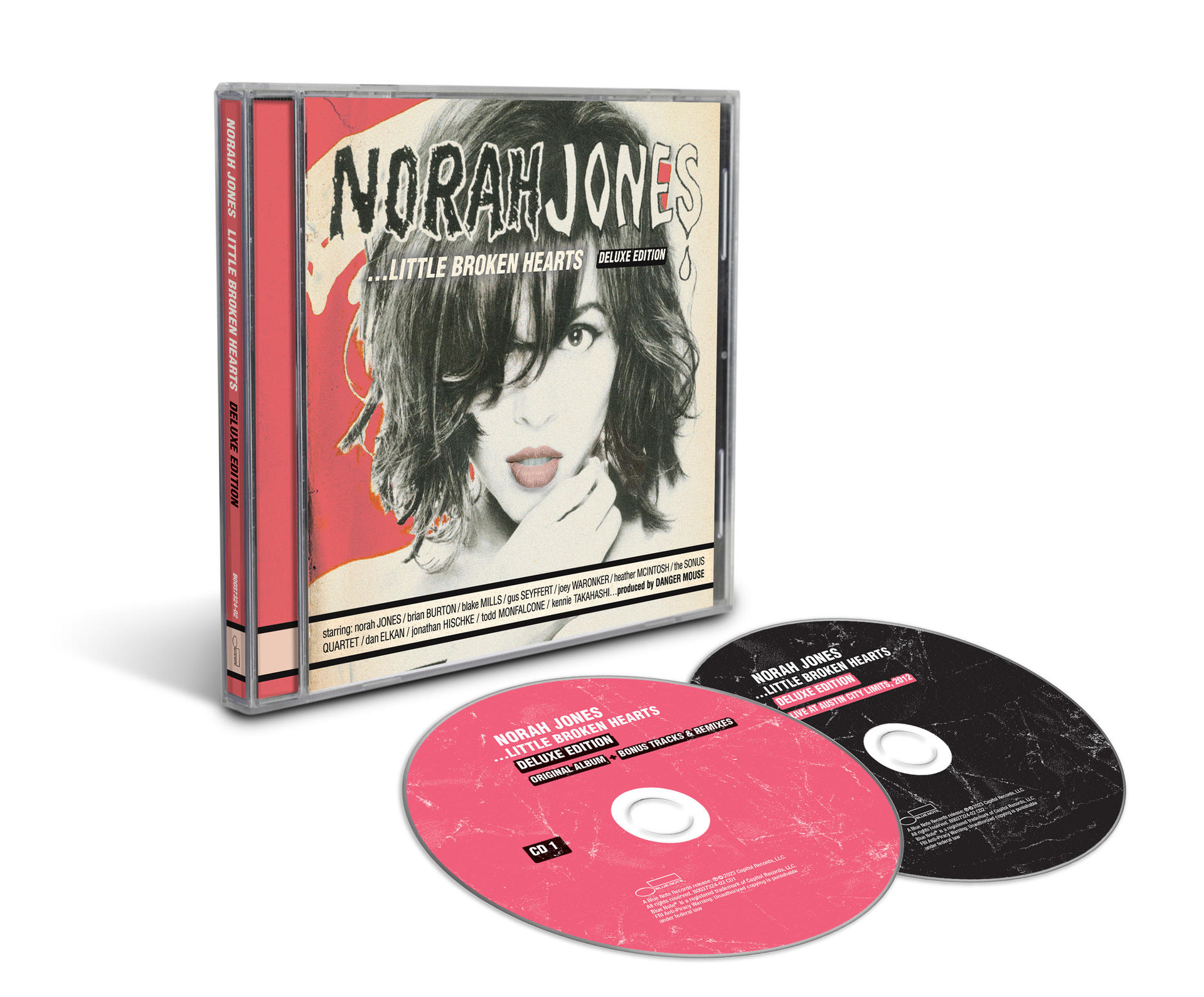 Eine CD-Hülle mit zwei Discs. Das Cover zeigt ein Frauenporträt und den Text 'Norah Jones'.
