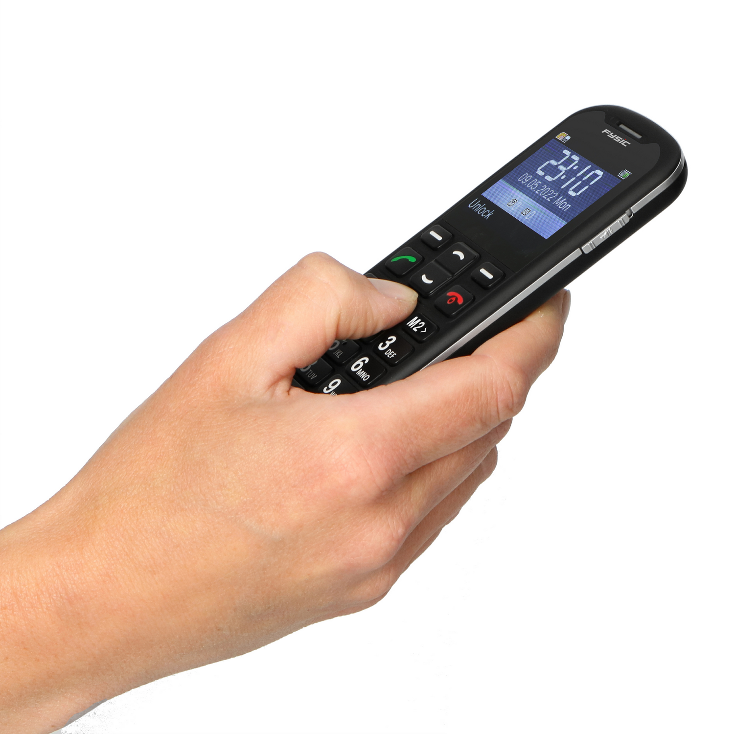A hand holding a black mobile phone displaying the time.