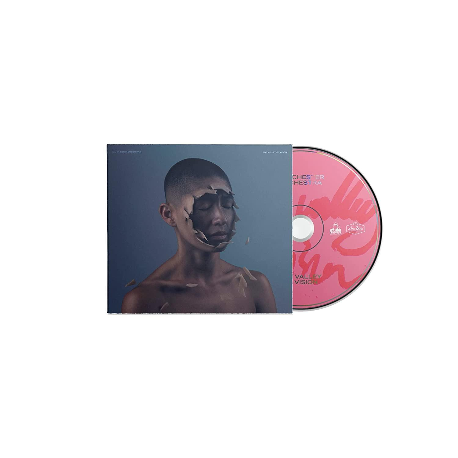 Albumcover mit einem Mann, dessen Gesicht teilweise von einer Maske verdeckt wird. CD rechts. Weißer Hintergrund.