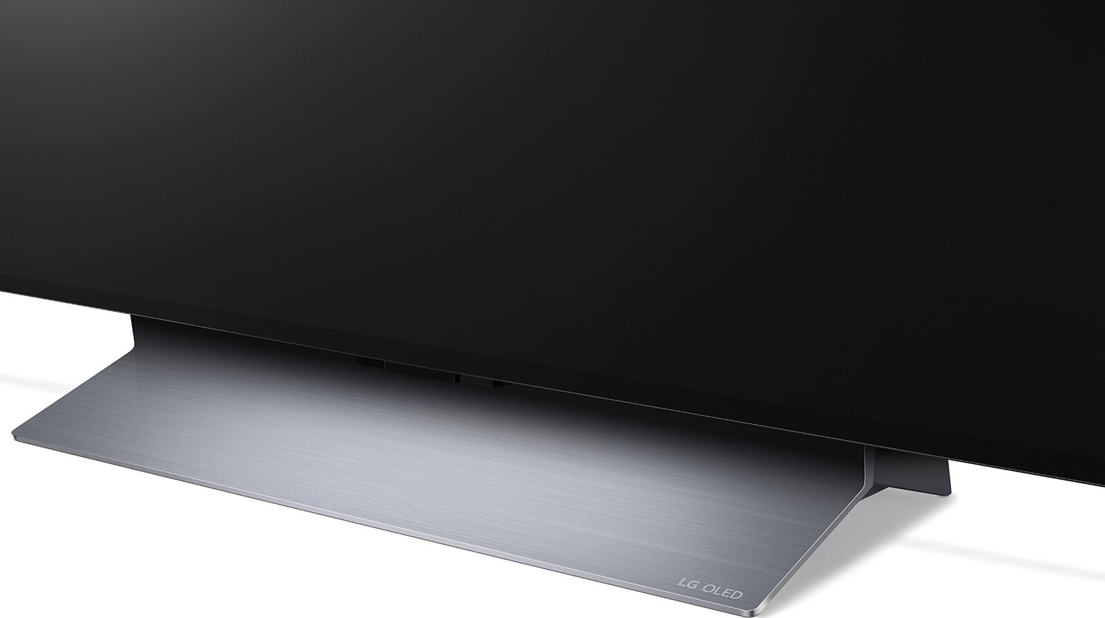Eine Low-Angle-Aufnahme eines TV-Sockels mit dem LG OLED-Logo.