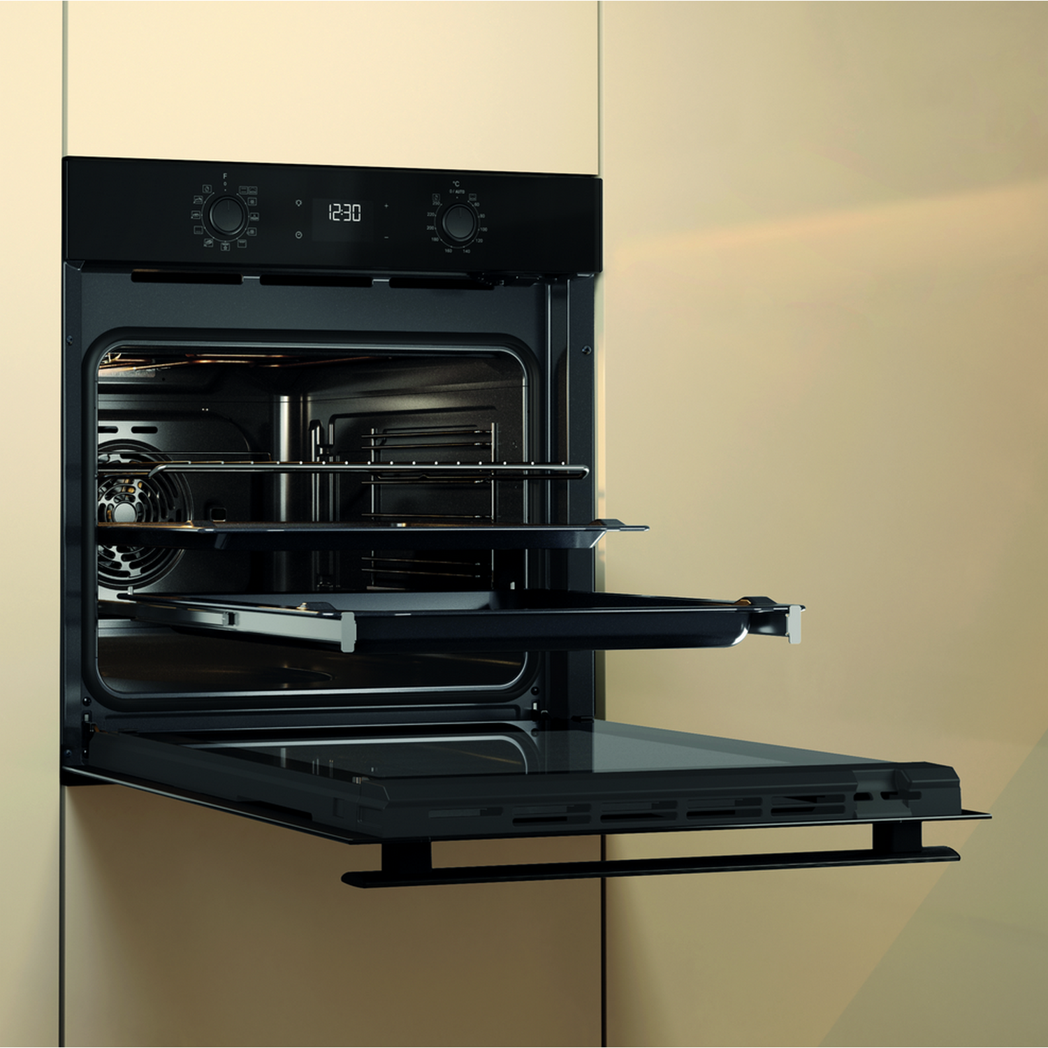 Black oven with door open, interior light on, and trays inside. Beige wall background.