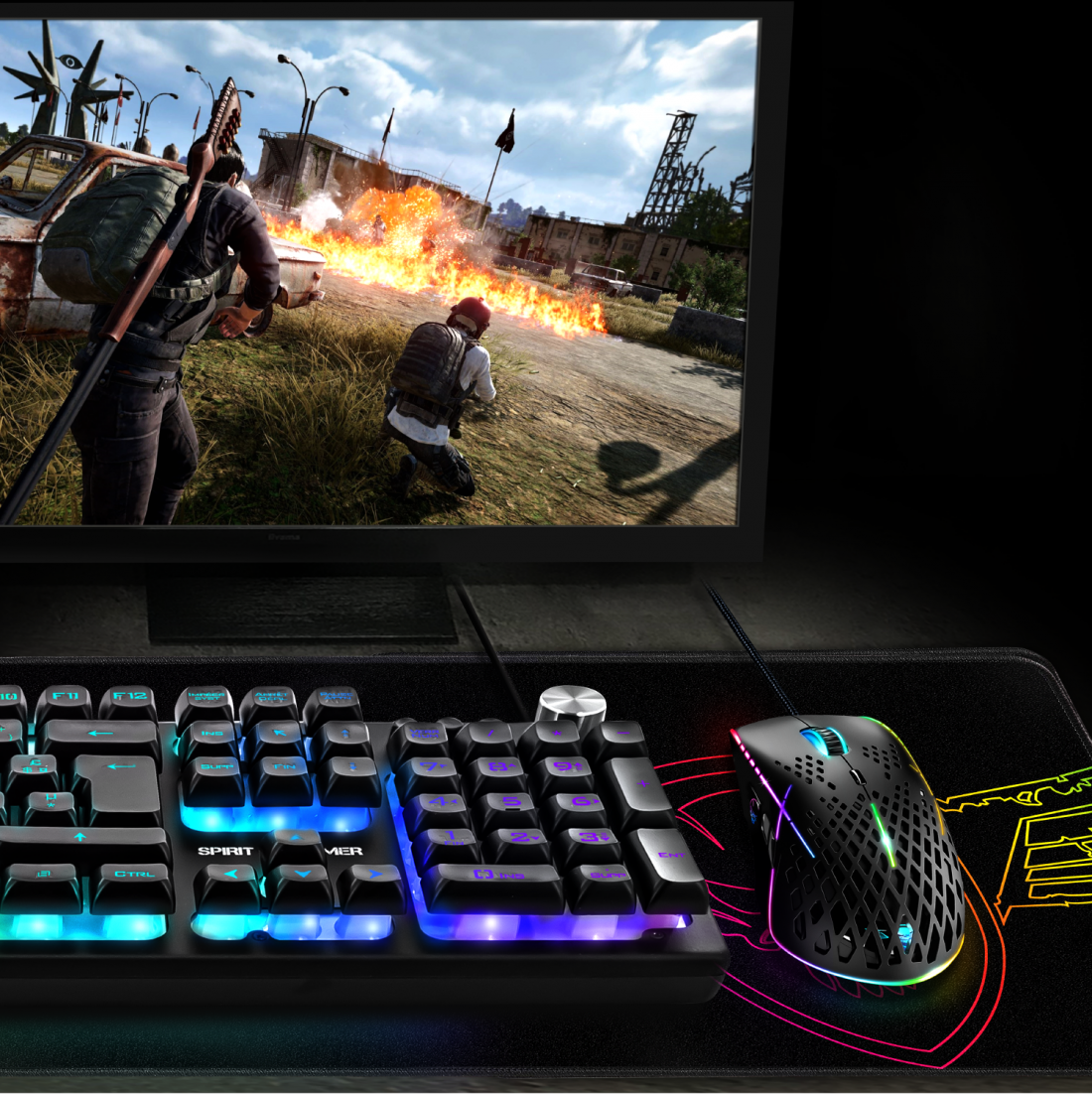 Gamer játszik a monitoron. Billentyűzet és egér az előtérben.