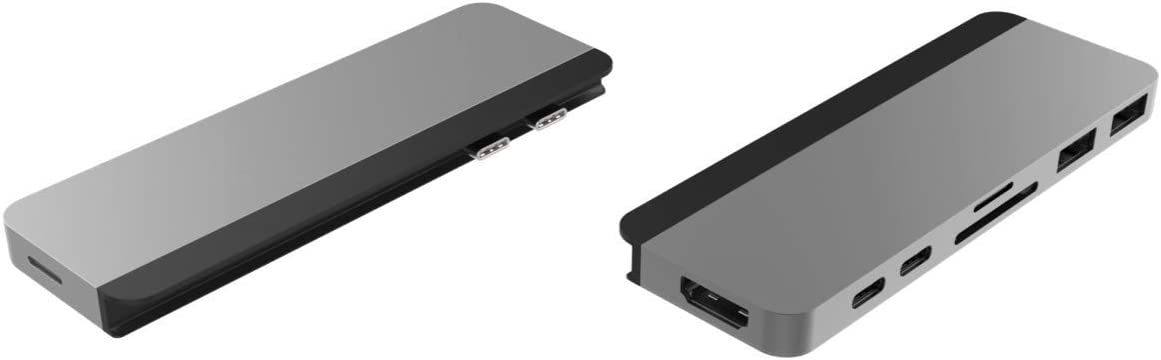 Dos concentradores USB-C plateados, uno con puertos y el otro con HDMI y más.